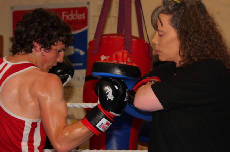Anne Armstrong with a boxer in training