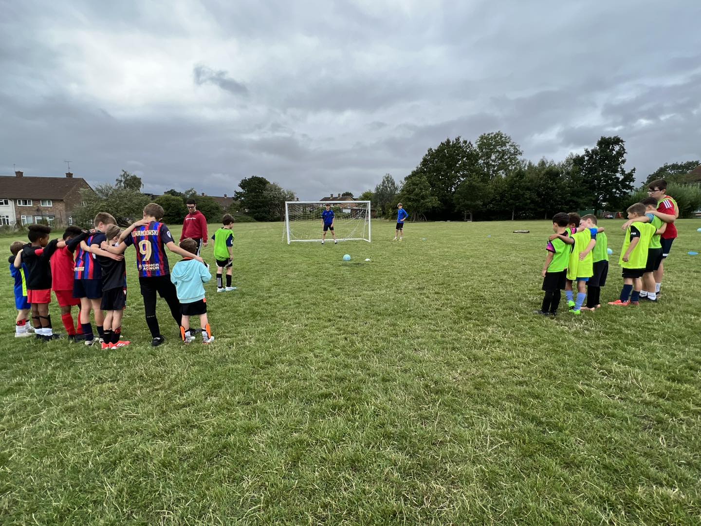 Children taking penalties at an MV Coaching football holiday camp