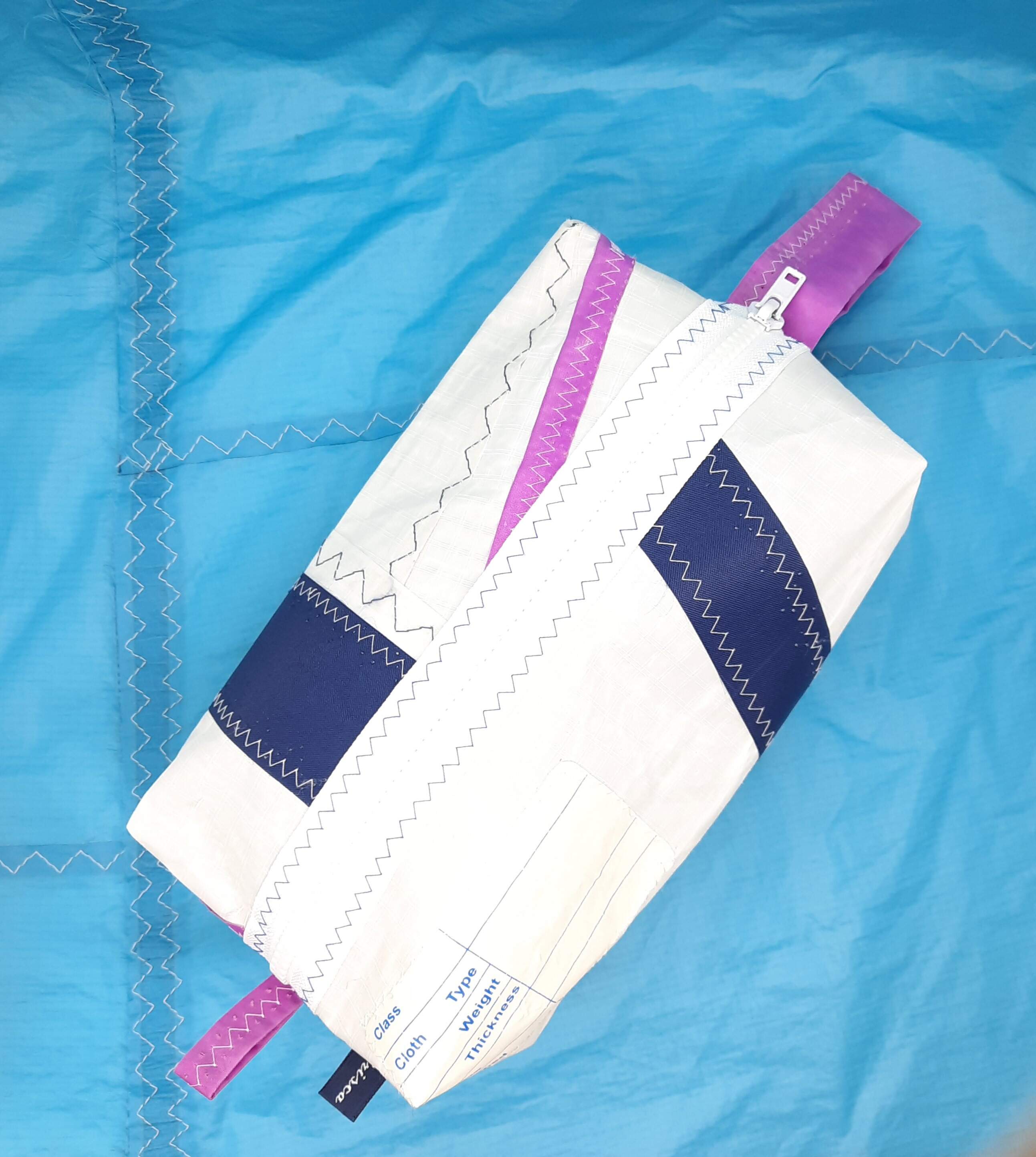Wash Bag with navy stripes and a white zip