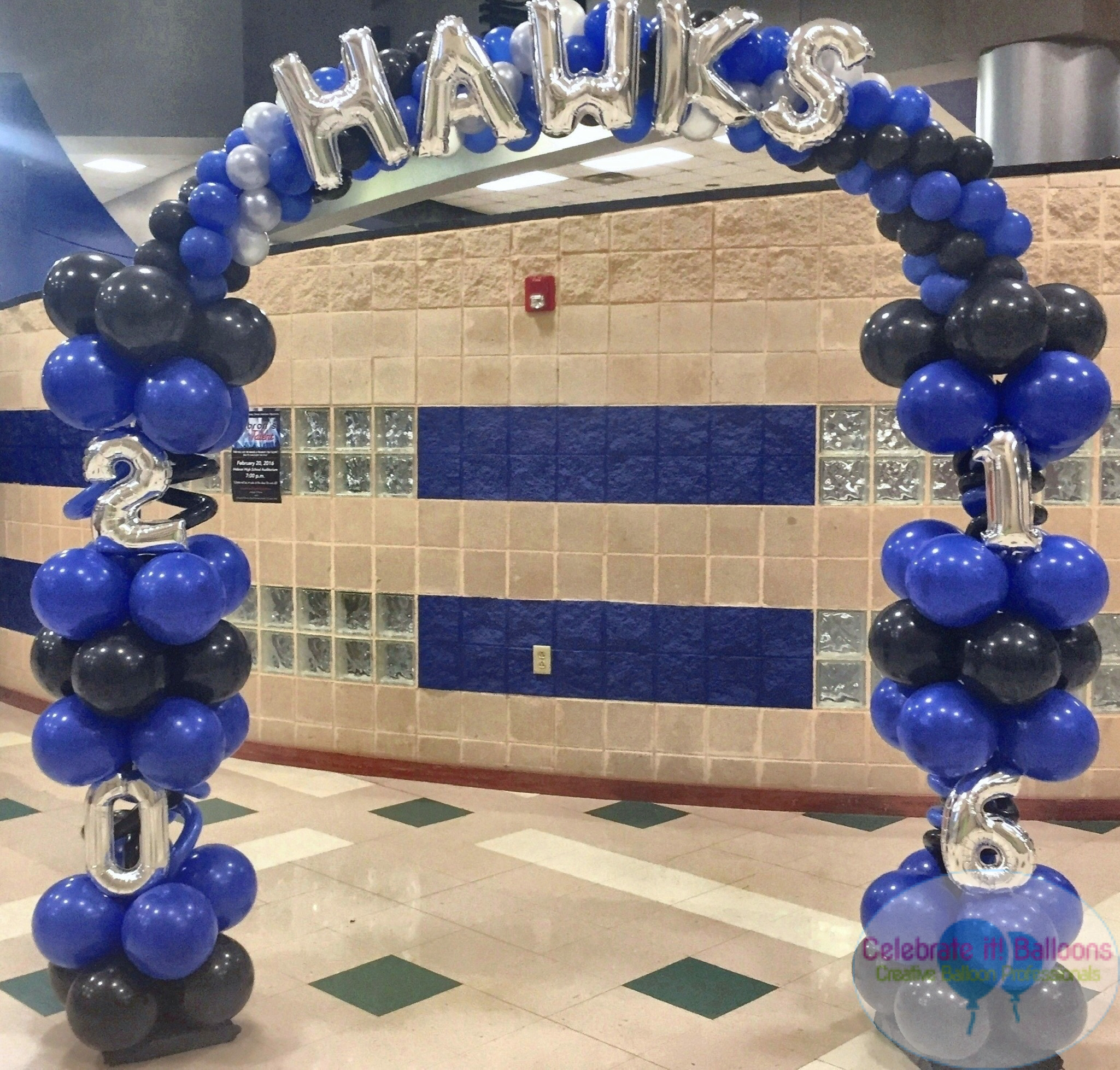 Royal blue, black and silver balloon arch with balloon letters