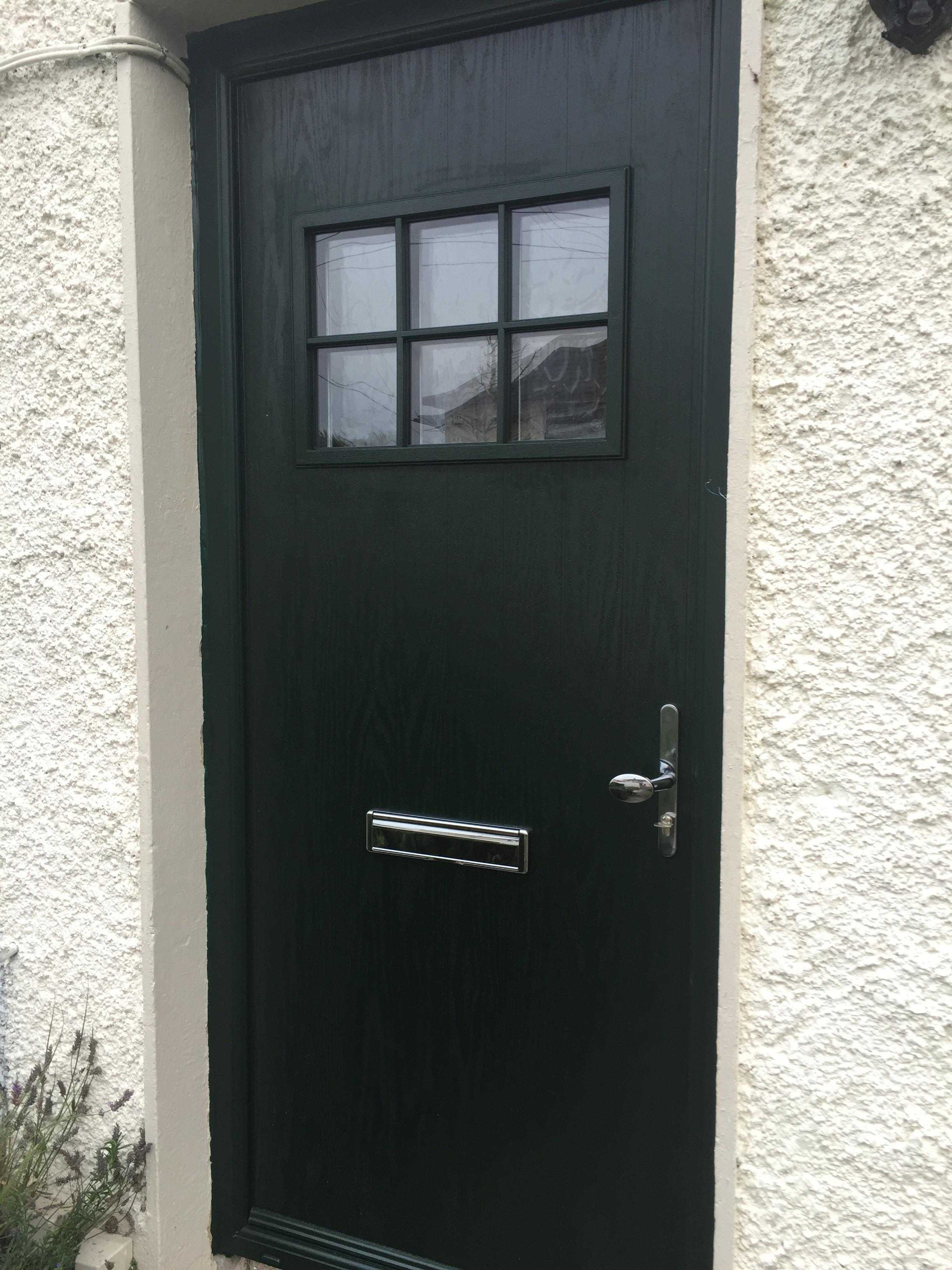 DARK GREEN APEER COMPOSITE DOOR FITTED BY ASGARD WINDOWS IN DUBLIN.