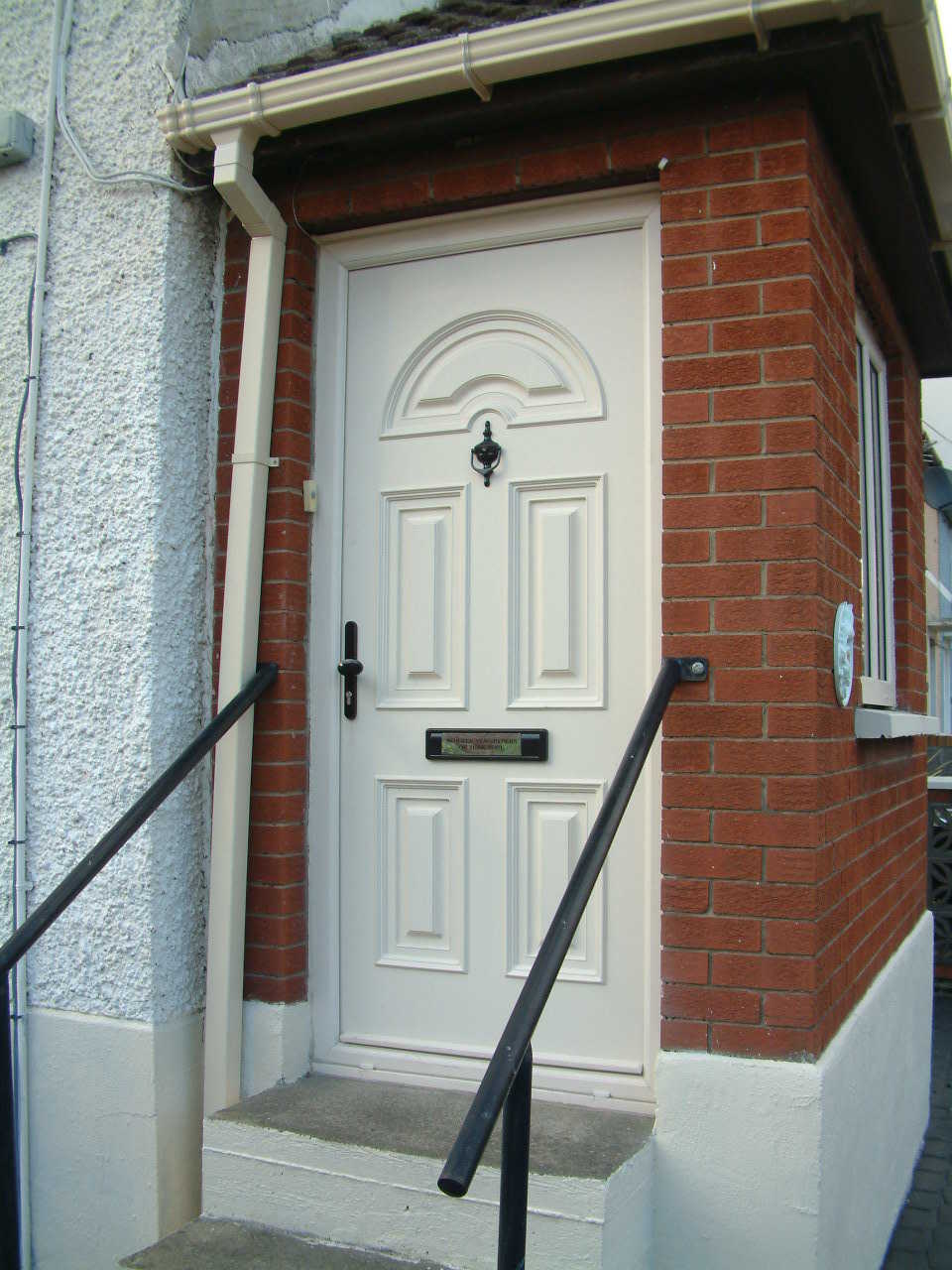 CREAM PALLADIO COMPOSITE DOOR FITTED  BY ASGARD WINDOWS IN DUBLIN 7.