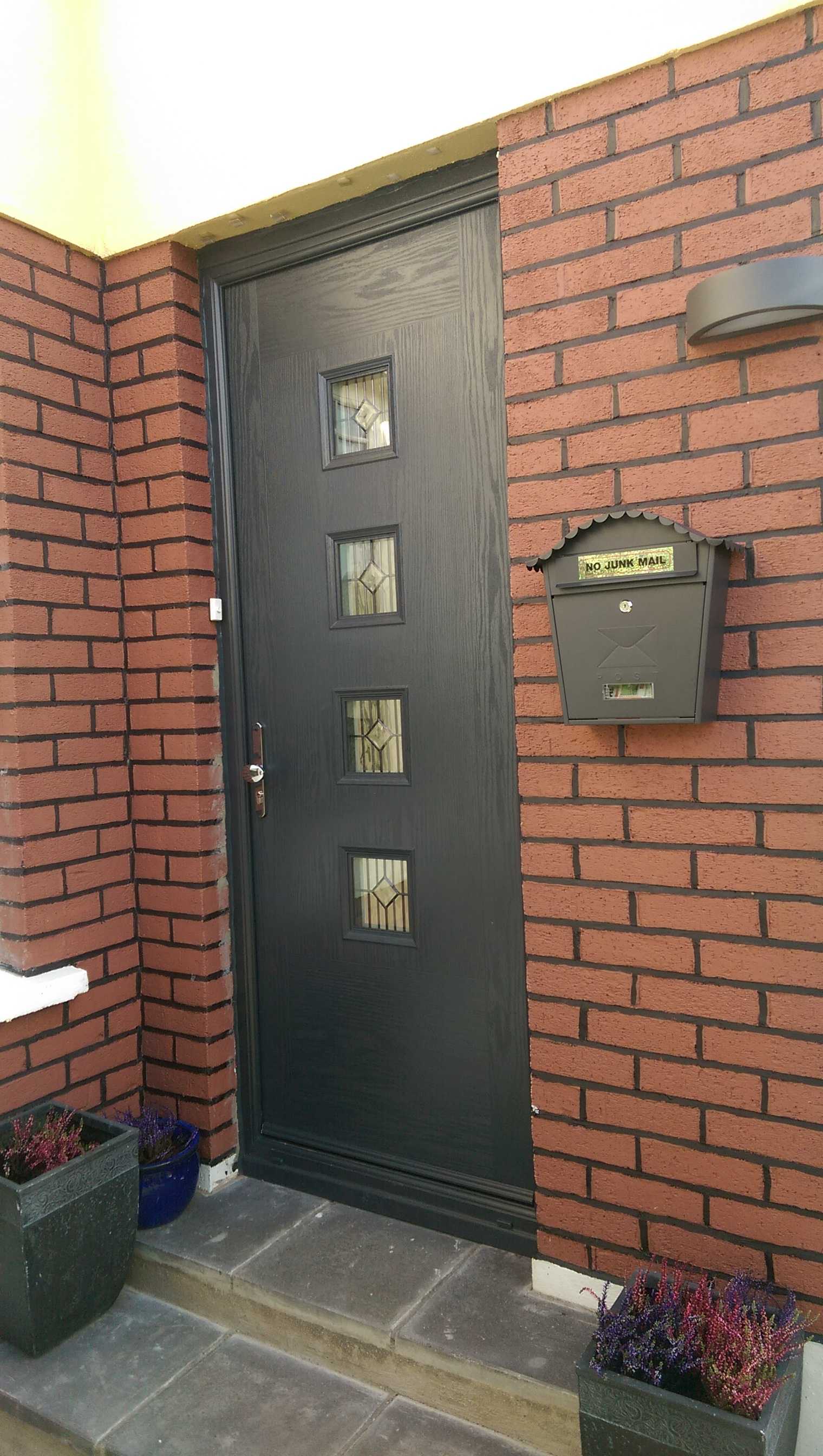 ANTHRACITE GREY APEER COMPOSITE FRONT FITTED BY ASGARD WINDOWS IN DUBLIN.