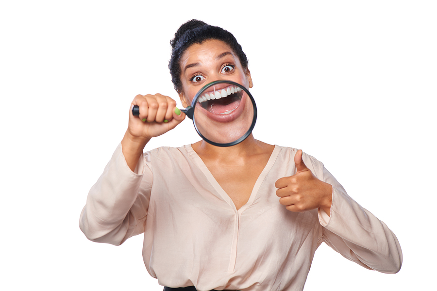 bigstock-Woman-smiling-and-show-teeth-t-112104188jpg
