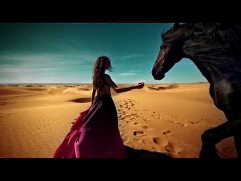 Woman and horse in the desert