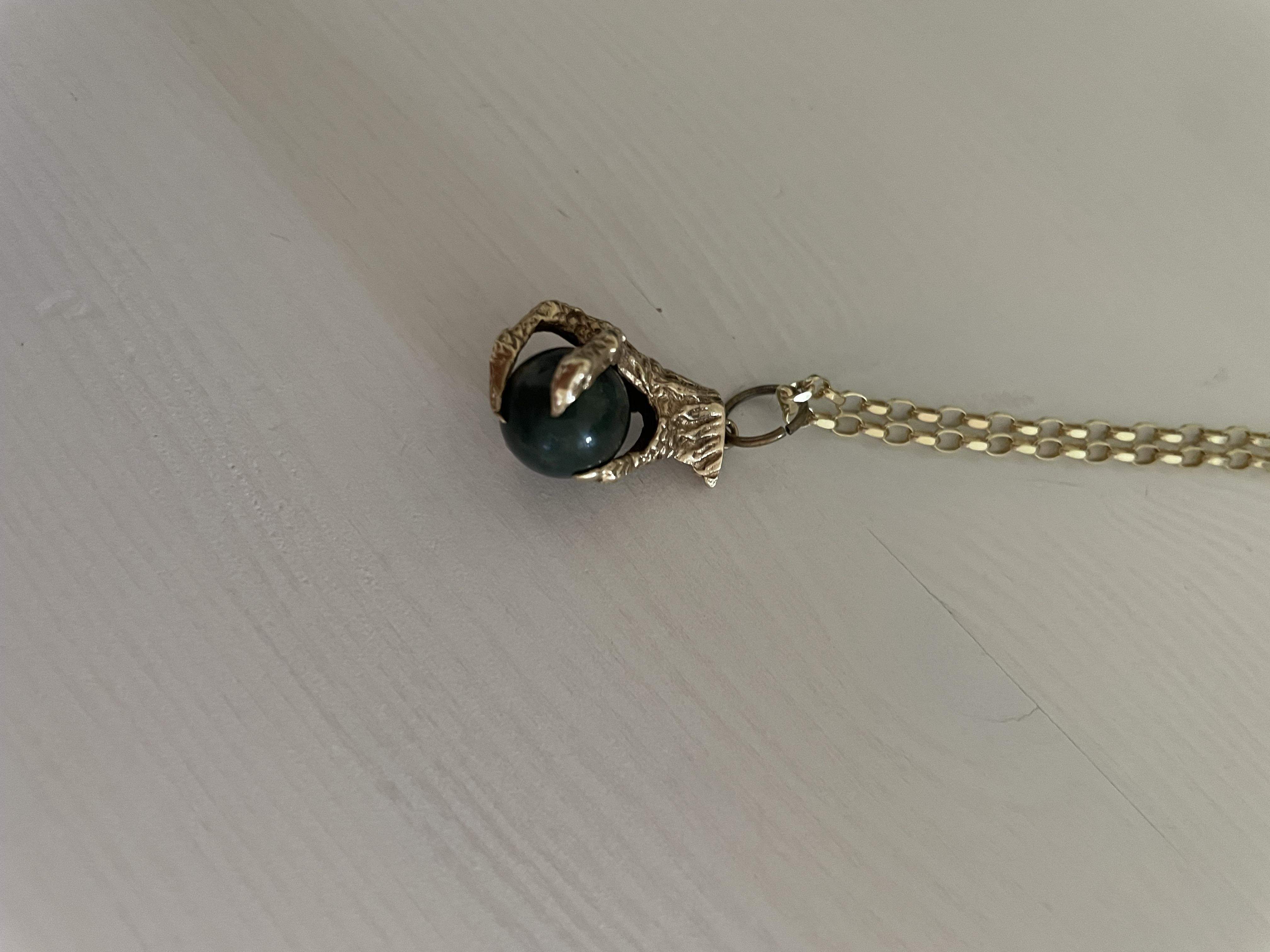 Claw pendant on chain