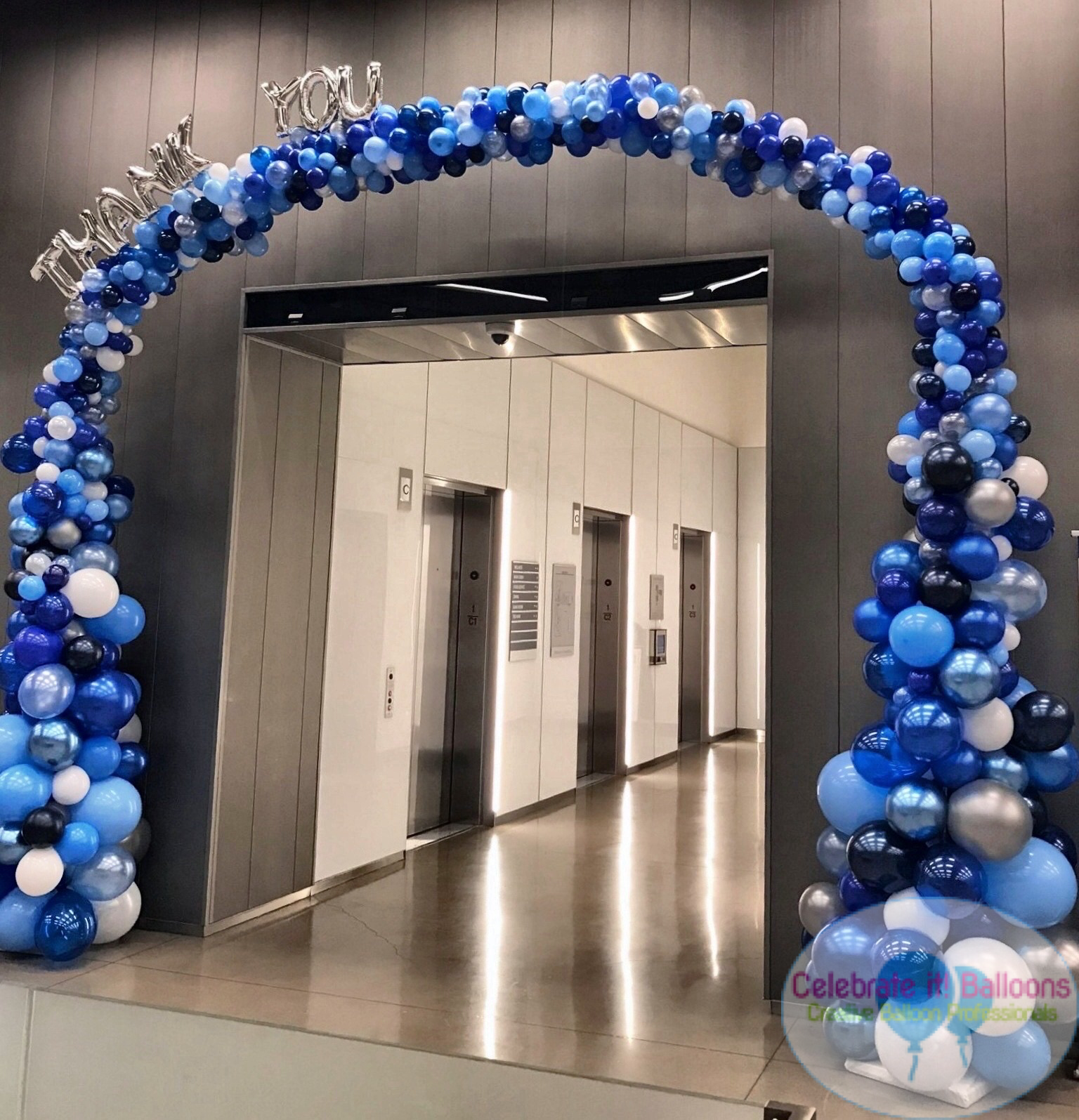 Organic balloon arch with letters