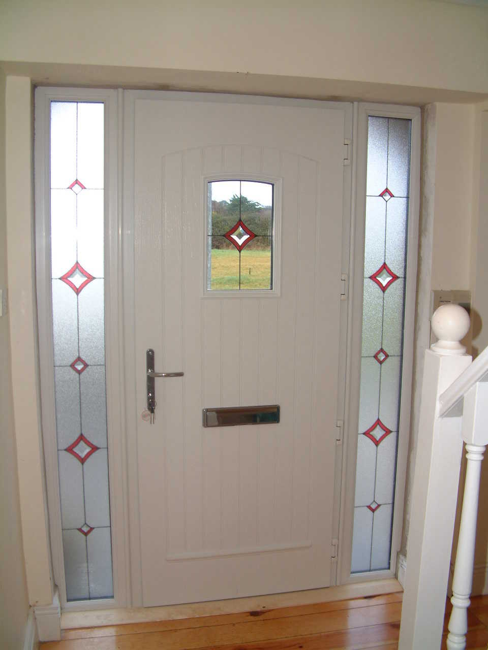 WHITE INSIDE PALLADIO T&G COMPOSITE dOOR FITTED IN DELGANY.