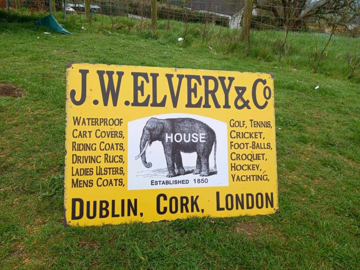 J.W Elvery Tin Sign