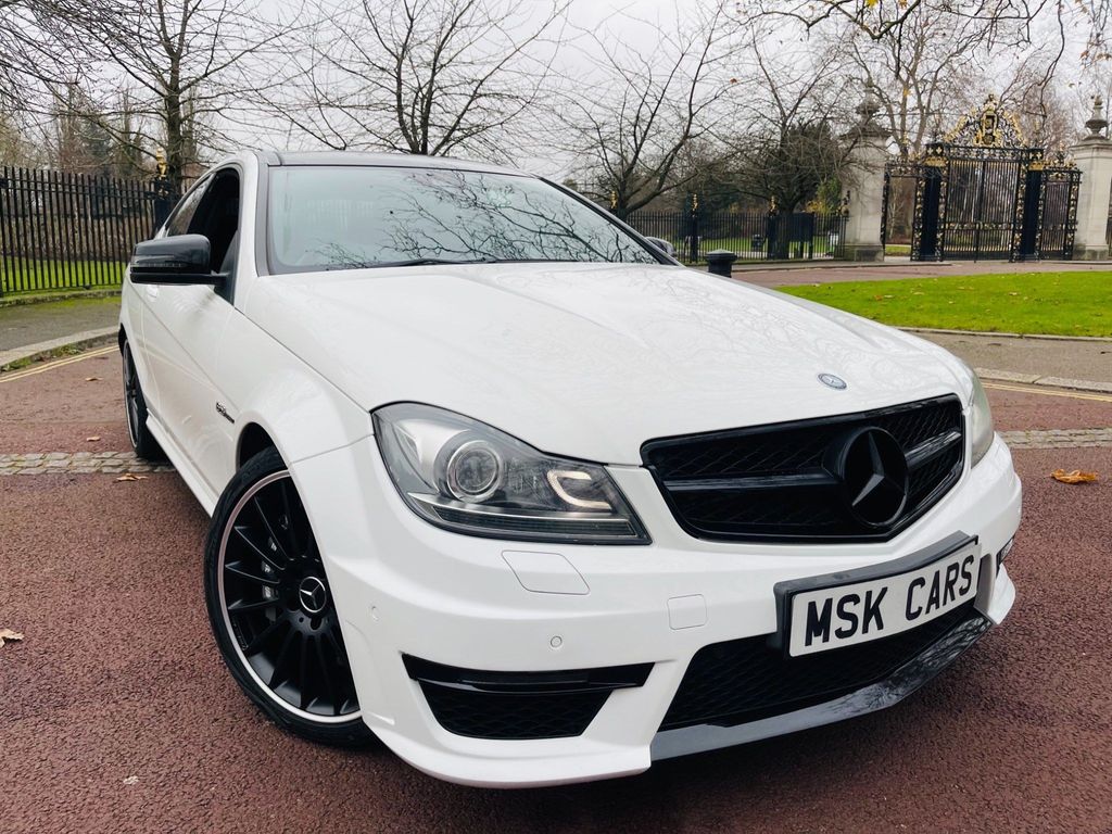 Factory White with a Full Black AMG Leather interior