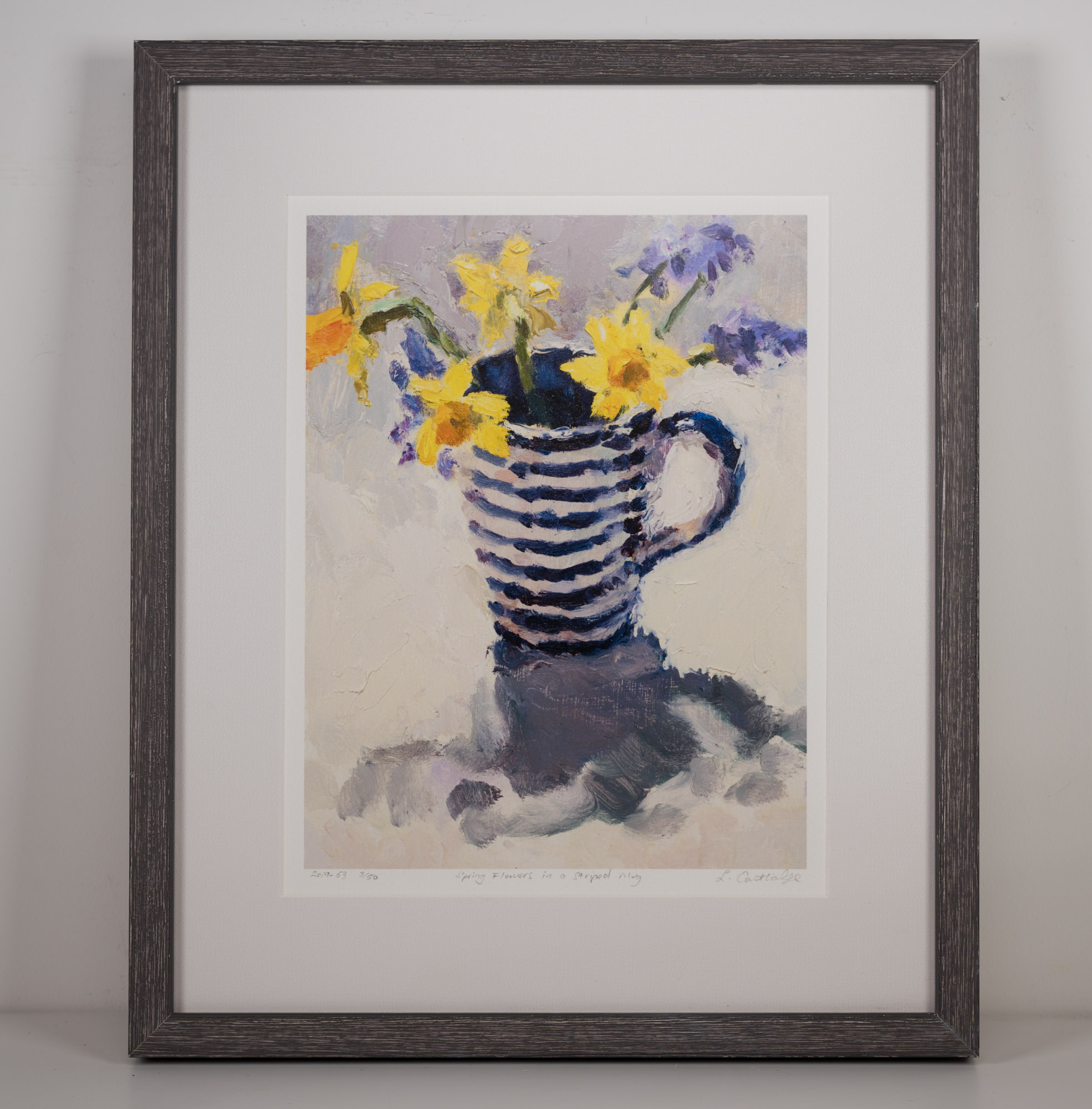 Spring Flowers in a Striped Mug