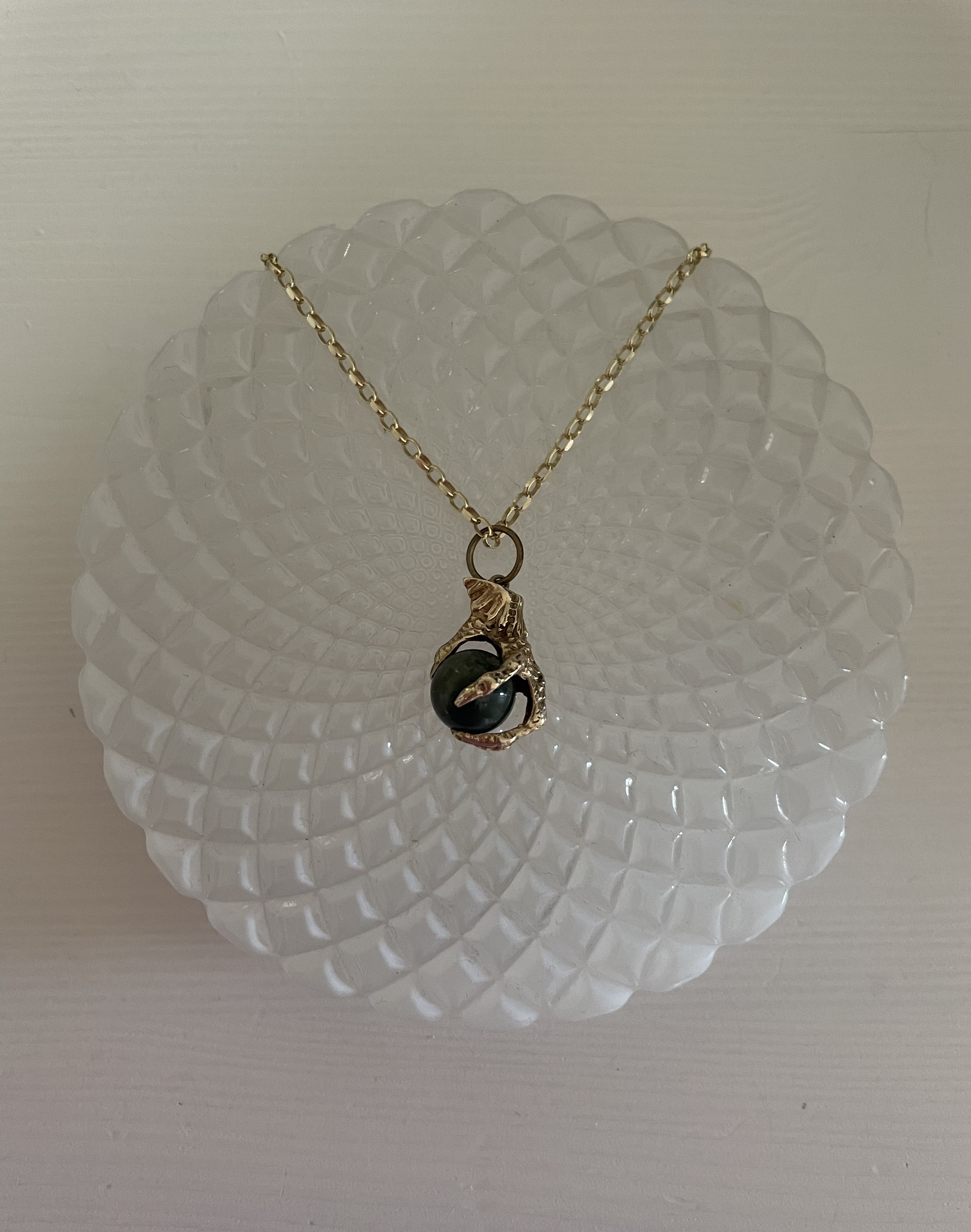 Claw pendant on chain