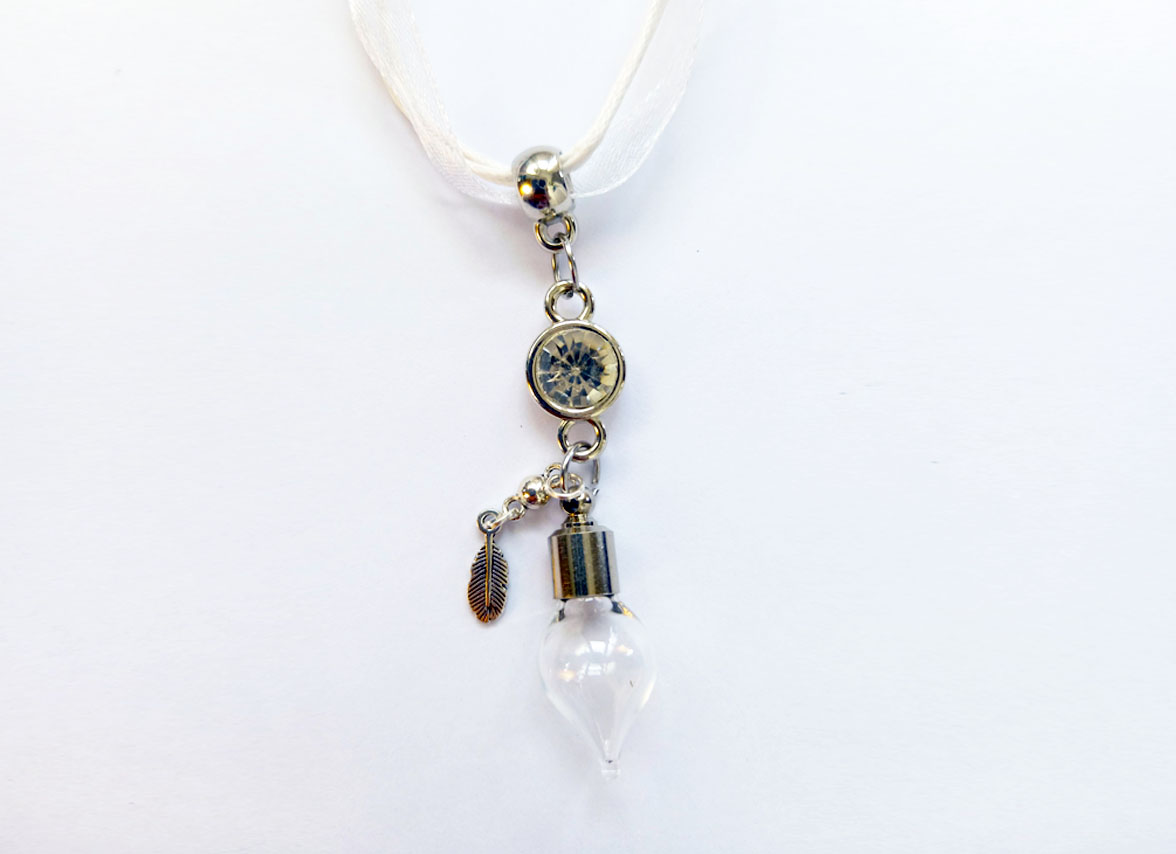 White Feather - Charmed Pendant filled with St.Brigid Well Water from an Irish Holy Well.