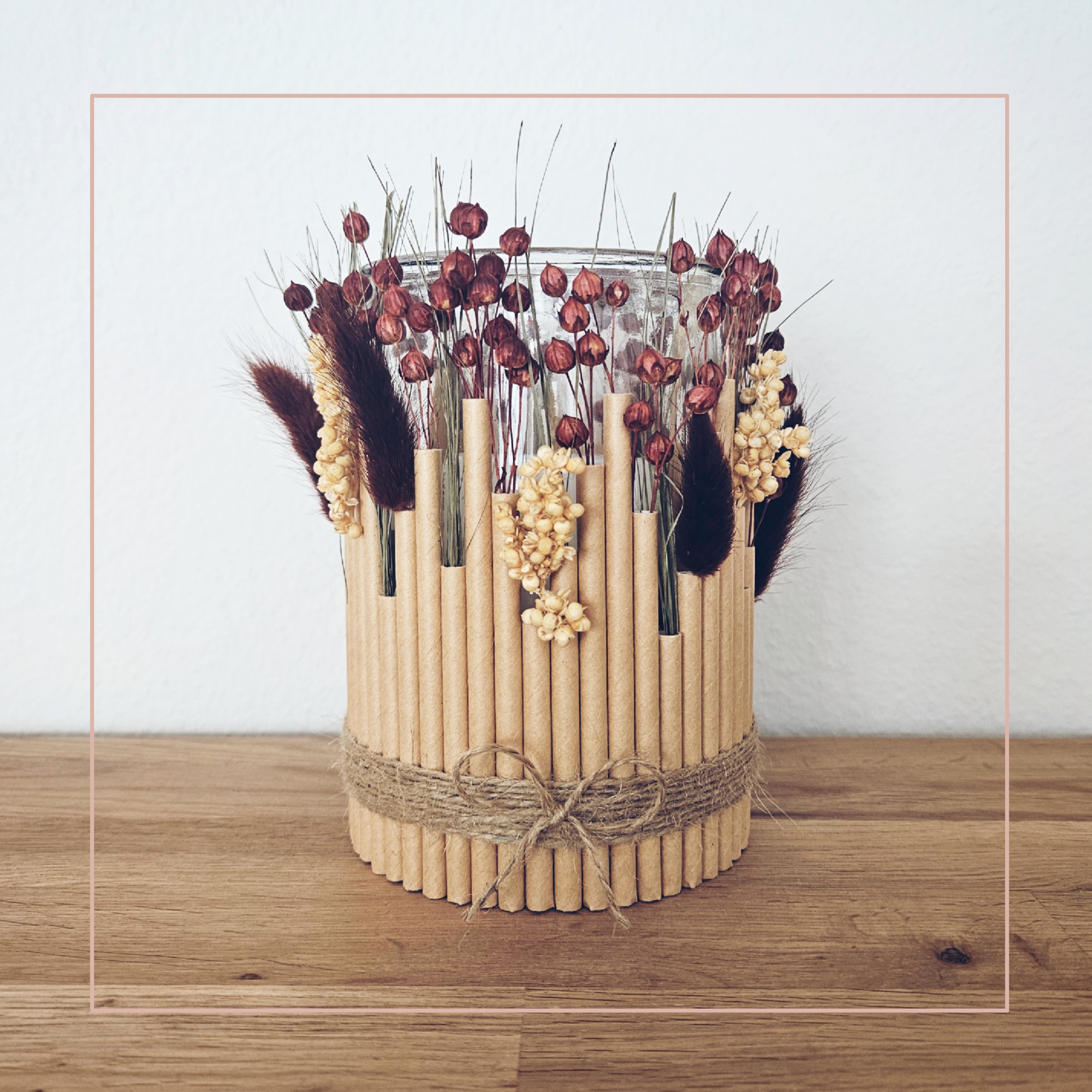 Kerzenglas mit Trockenblumen