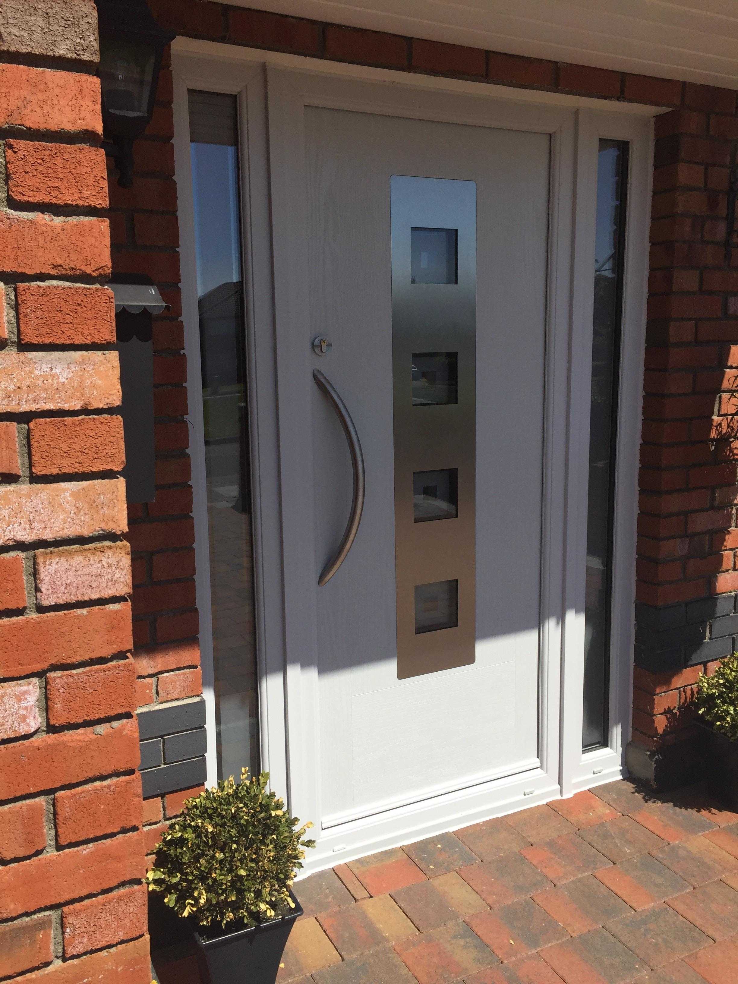 LIGHT GREY MODO COMPOSITE FRONT DOOR FITTED BY ASGARD WINDOWS IN DUBLIN.