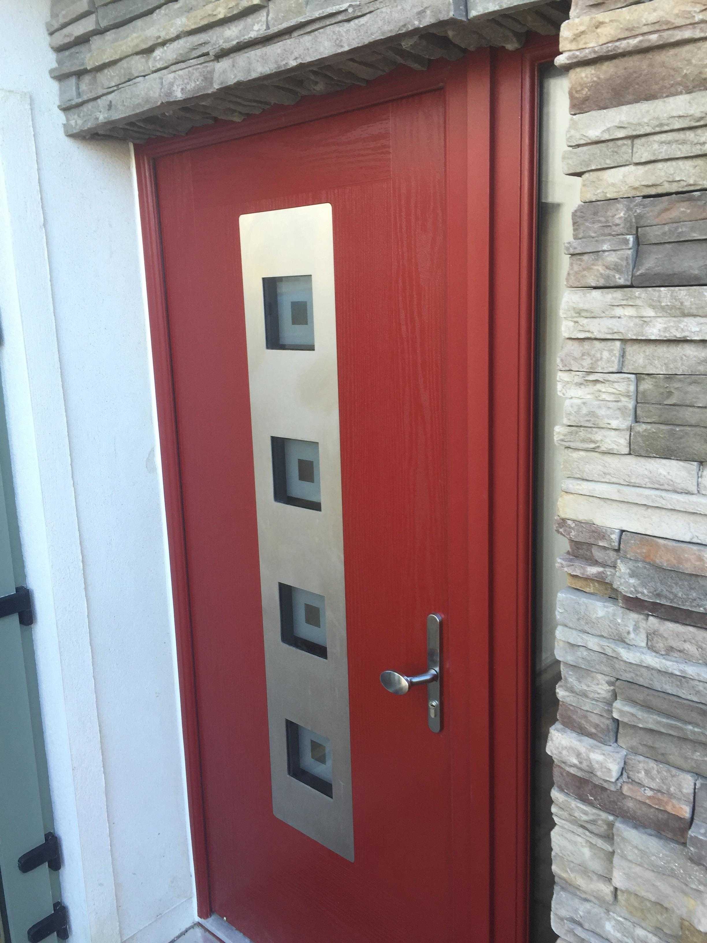 RED MODO COMPOSITE FRONT DDOR FITTED BY ASGARD WINDOWS IN DUBLIN.