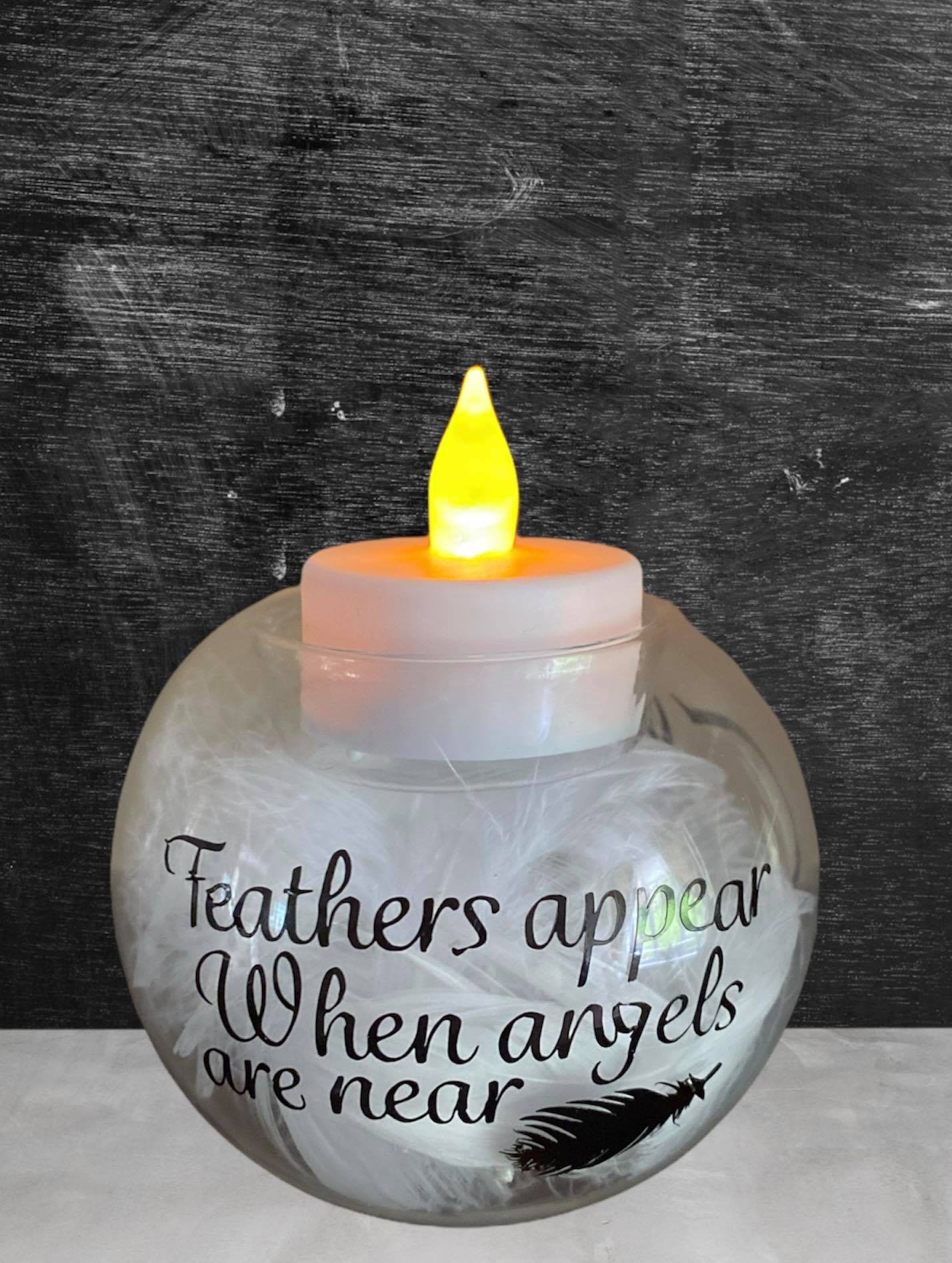 "Feathers appear when angles are near" Tealight Holder