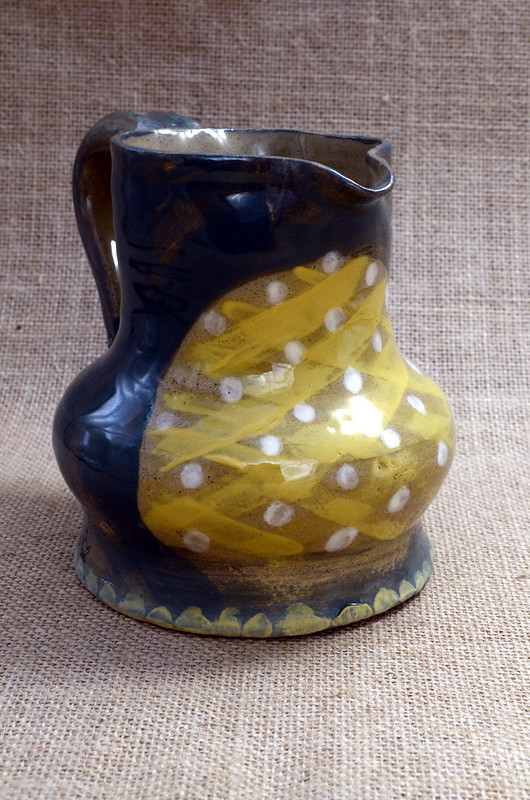 Medieval style jug on stoneware