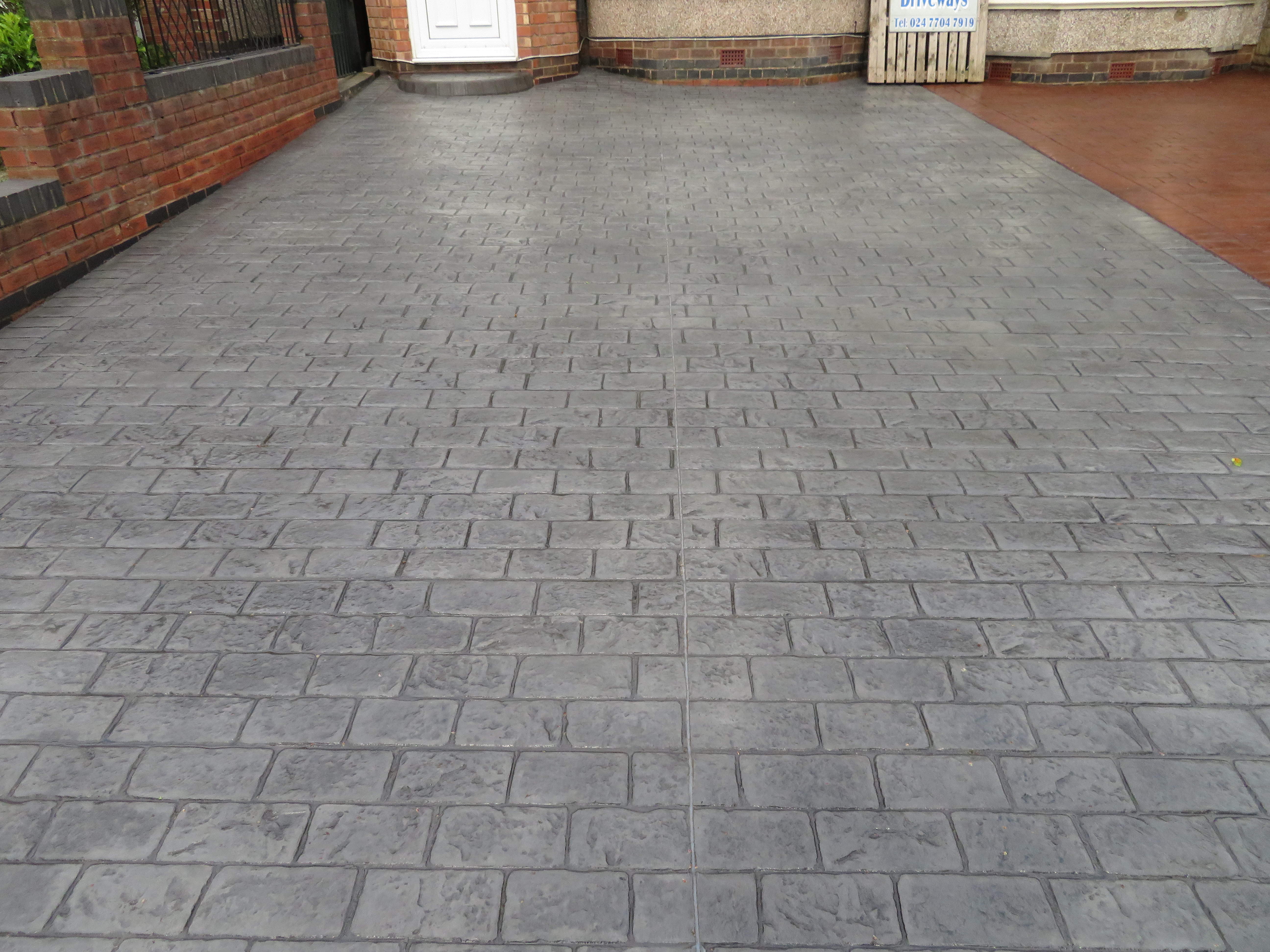 Pattern Imprinted Concrete Driveway done in a Textured Cobble Pattern