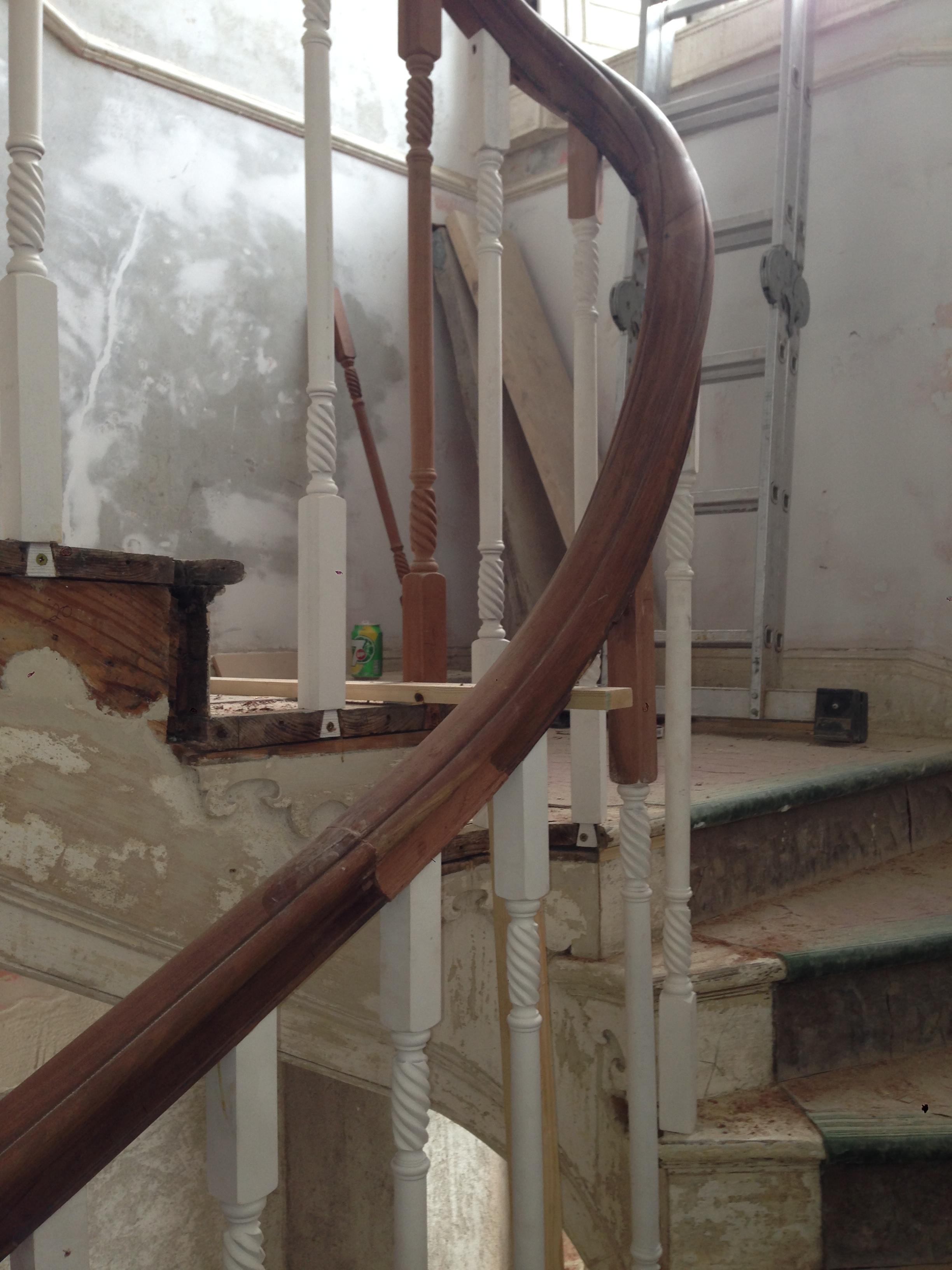 New balusters turned to match existing iron examples where timber has been lost