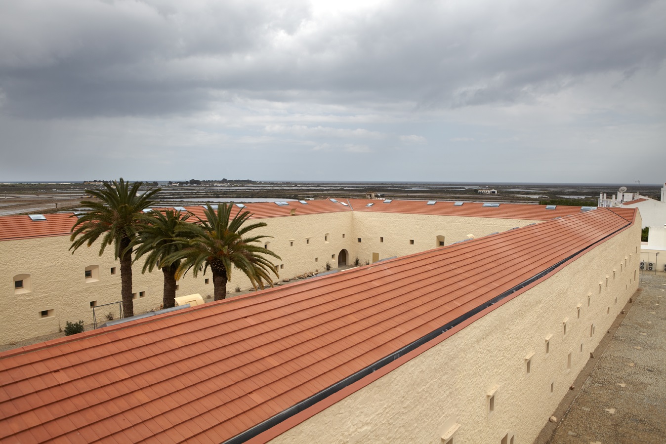 CS Plasma tiles on large low pitch roof of a convent in Portugal.