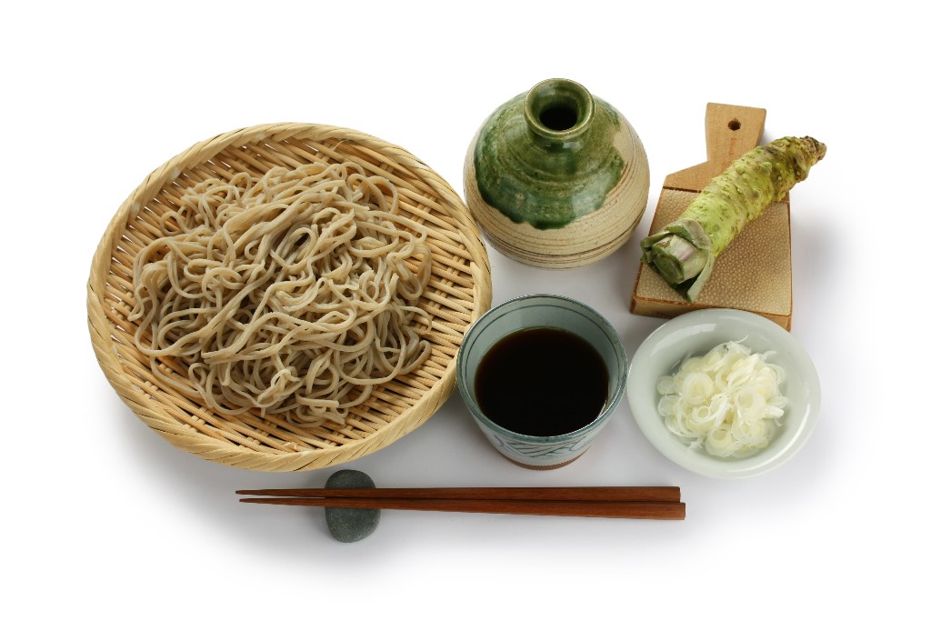 Soba served with a dipping sauce; can enjoy them even more by mixing green onions and fresh wasabi into the dipping sauce. Dip the soba noodles into the sauce or simply place the wasabi paste on top of the soba noodles.