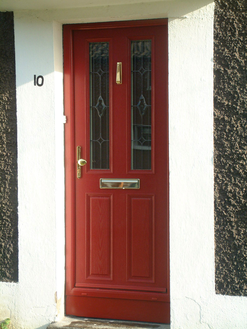 RED APEER COMPOSITE FRONT DOOR FITTED BY ASGARD WINDOWS IN DUBLIN