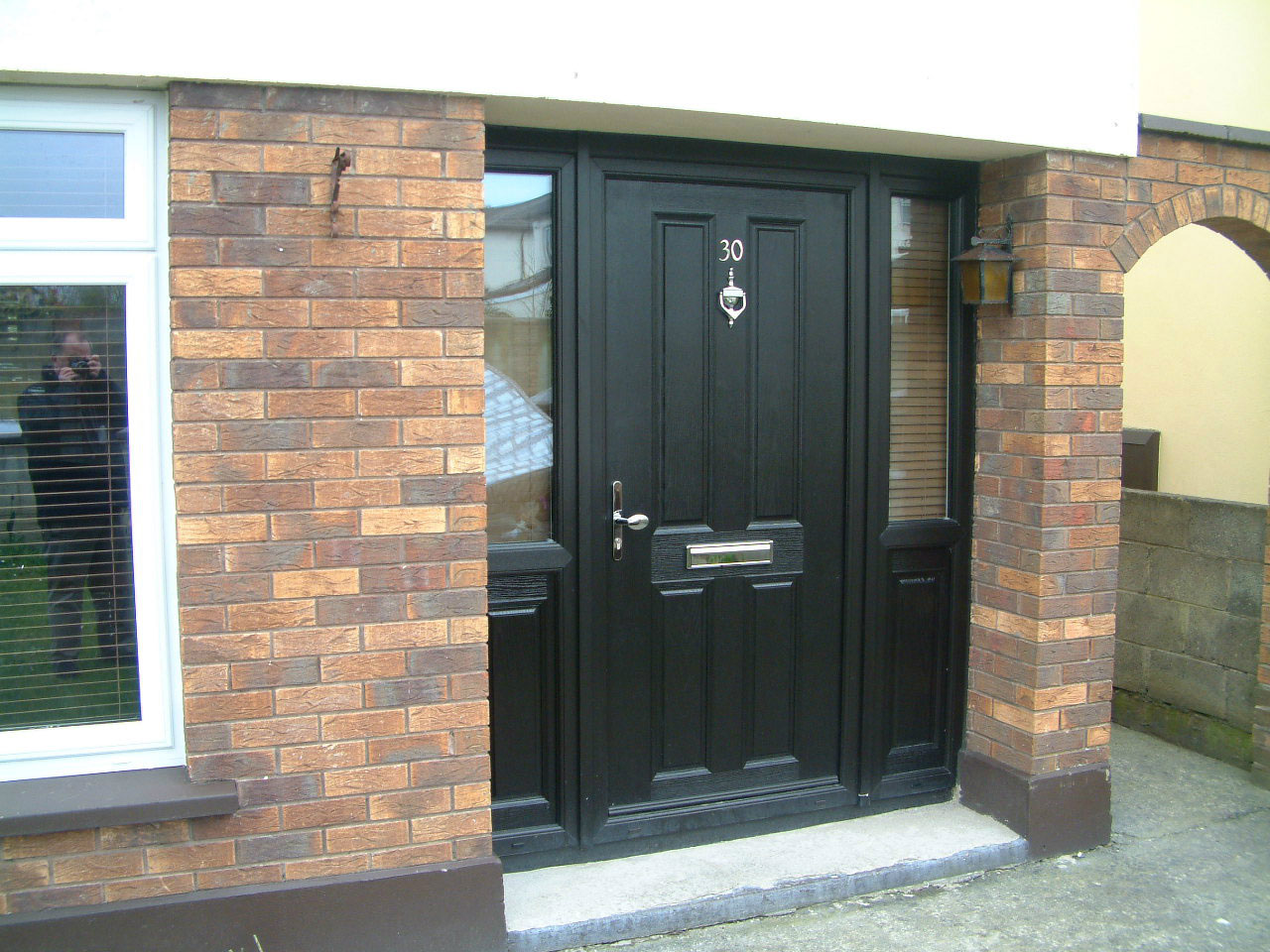 BLACK APEER APM1 COMPOSITE FRONT DOOR FITTED BY ASGARD WINDOWS IN DUBLIN 15.