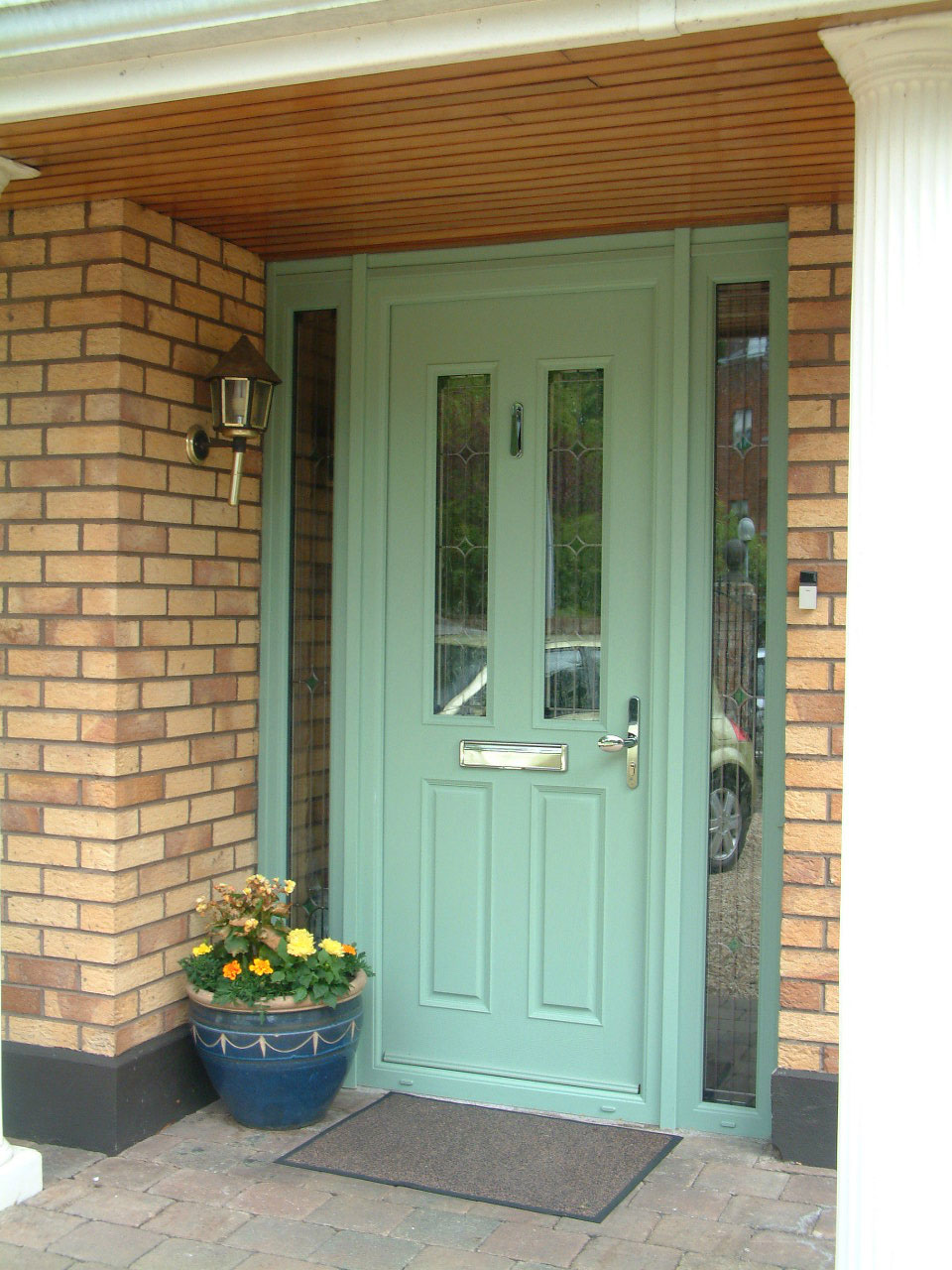 CHARTWELL GREEN APEER APM2 COMPOSITE FRONT DOOR FITTED BY ASGARD WINDOWS IN DUBLIN.