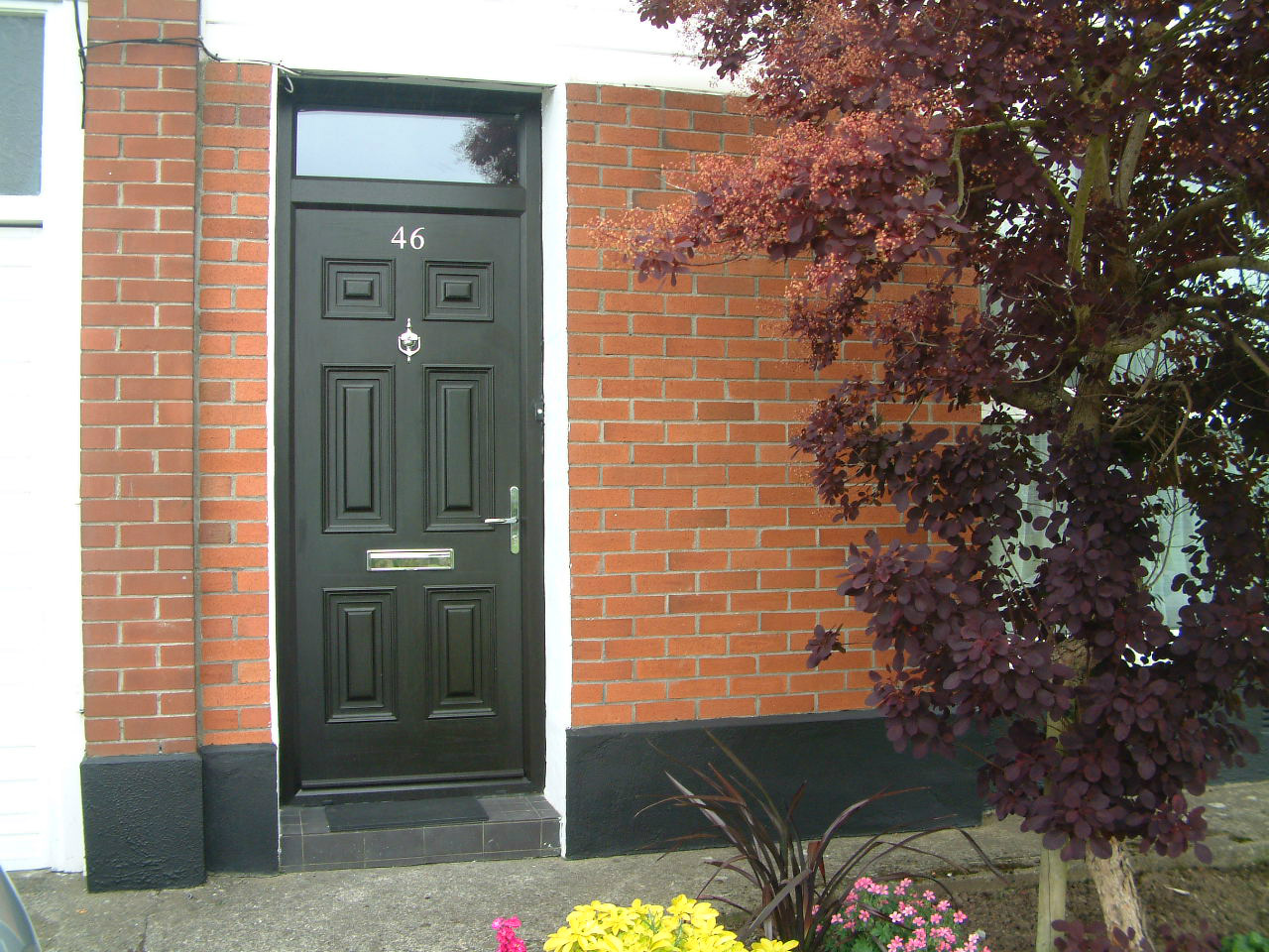 BLACK PALLADIO GEORGIAN FRONT COMPOSITE DOOR FITTED BY ASGARD WINDOWS IN DUBLIN 18.