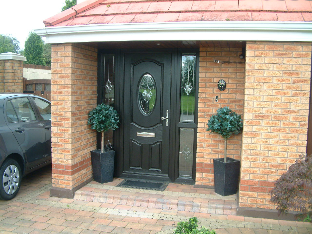 BLACK APEER COMPOSITE FRONT DOOR FITTED BY ASGARD WINDOWS IN DUBLIN.