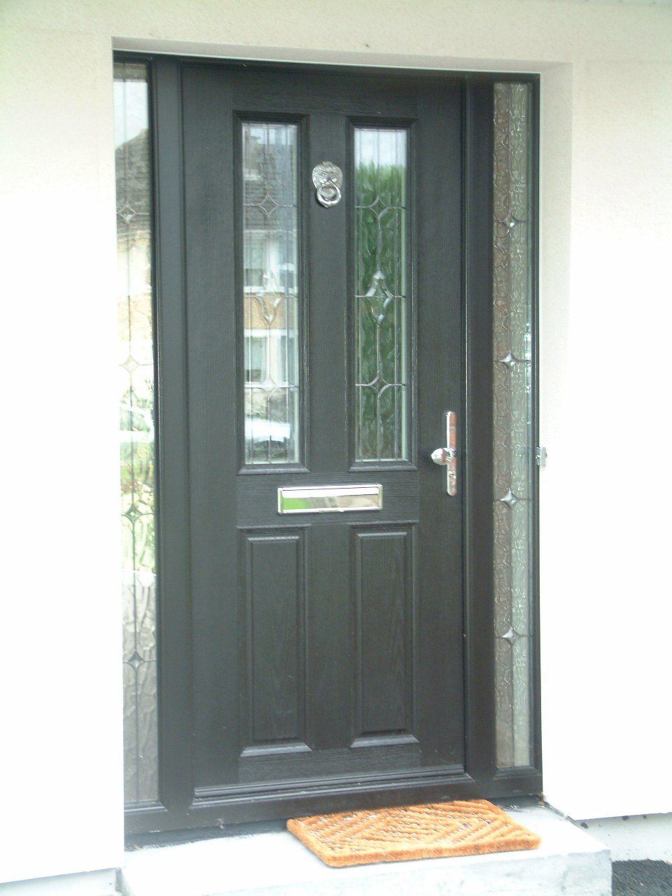BLACK APEER COMPOSITE FRONT DOOR FITTED BY ASGARD WINDOWS IN DUBLIN.