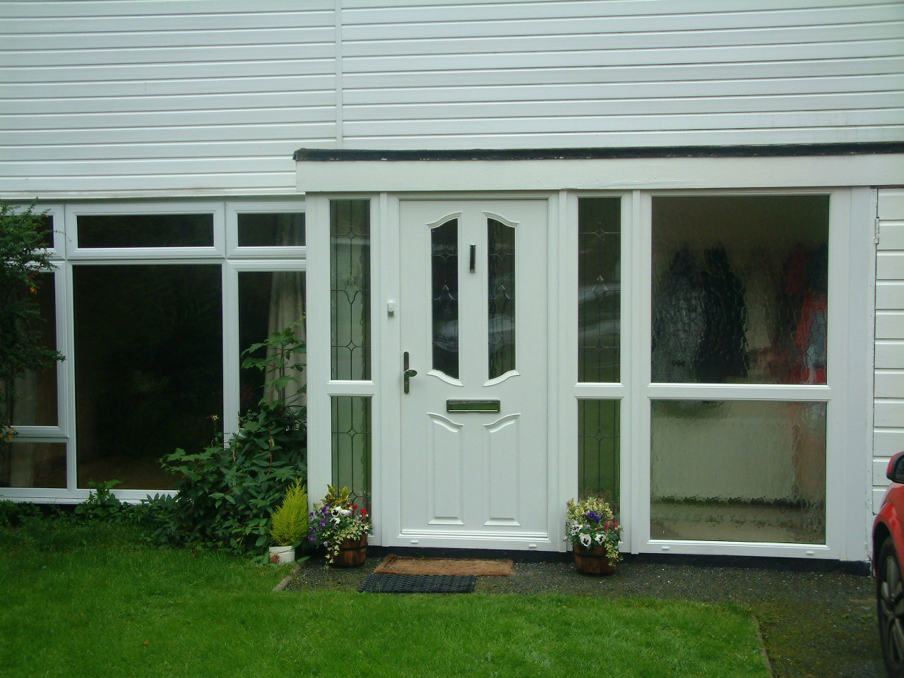 WHITE APEER APL2 COMPOSITE FRONT DOOR FITTED BY ASGARD WINDOWS IN DUBLIN 22.