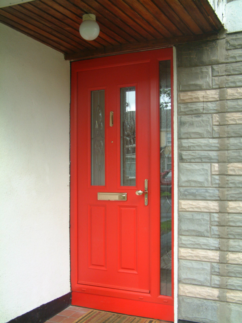 TRAFFIC RED APEER APM2 COMPOSITE FRONT DDOR FITTED BY ASGARD WINDOWS IN DUBLIN 15.