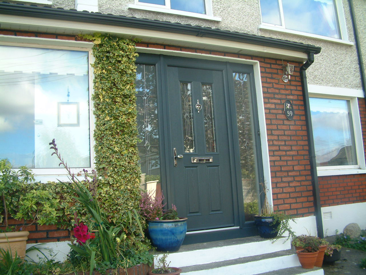 ANTHRACITE GREY APEER APM2 COMPOSITE FRONT DOOR FITTED BY ASGARD WINDOWS IN DUBLIN 16.