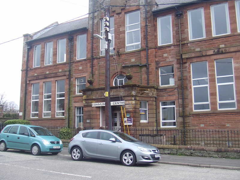The IT Centre in Castle Douglas with cars parked outside the Community Centre
