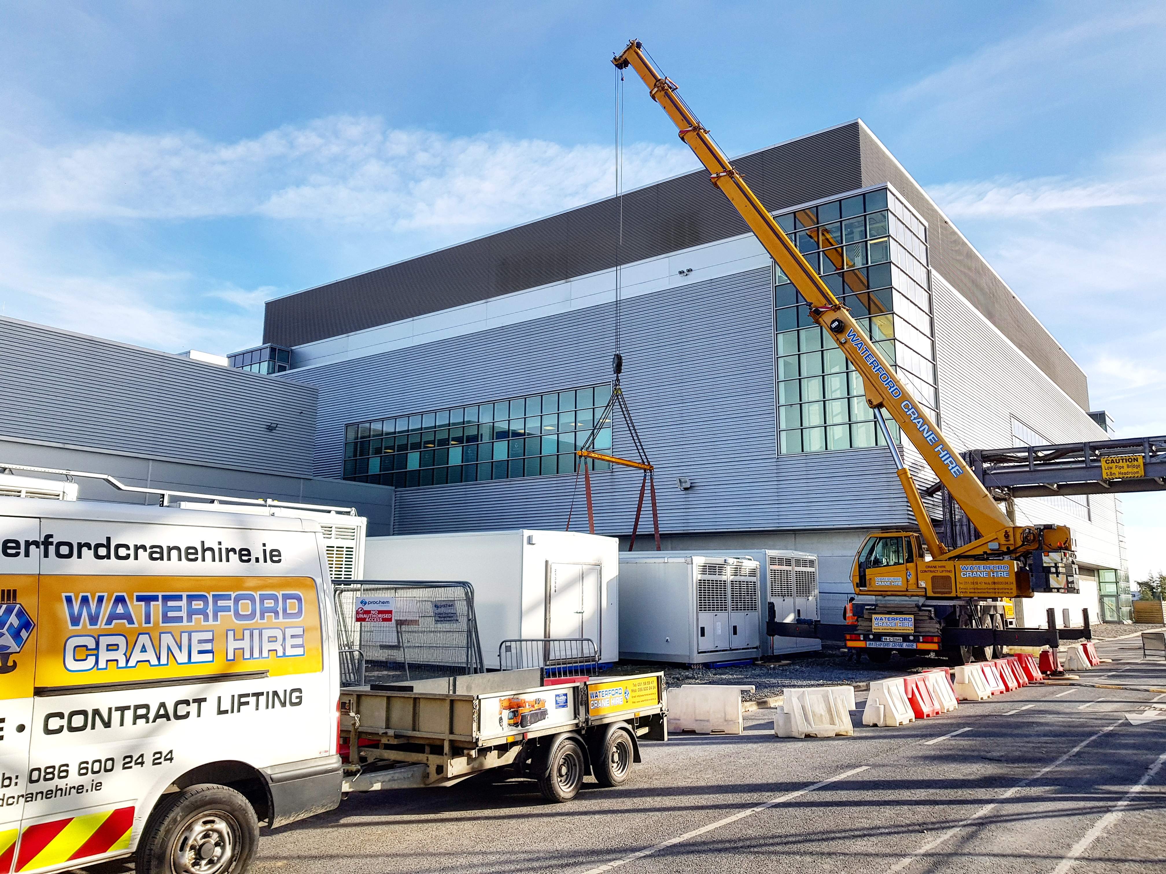 Lifting 11 tonne chiller rooms into position under contract lift conditions at Sanofi, Waterford