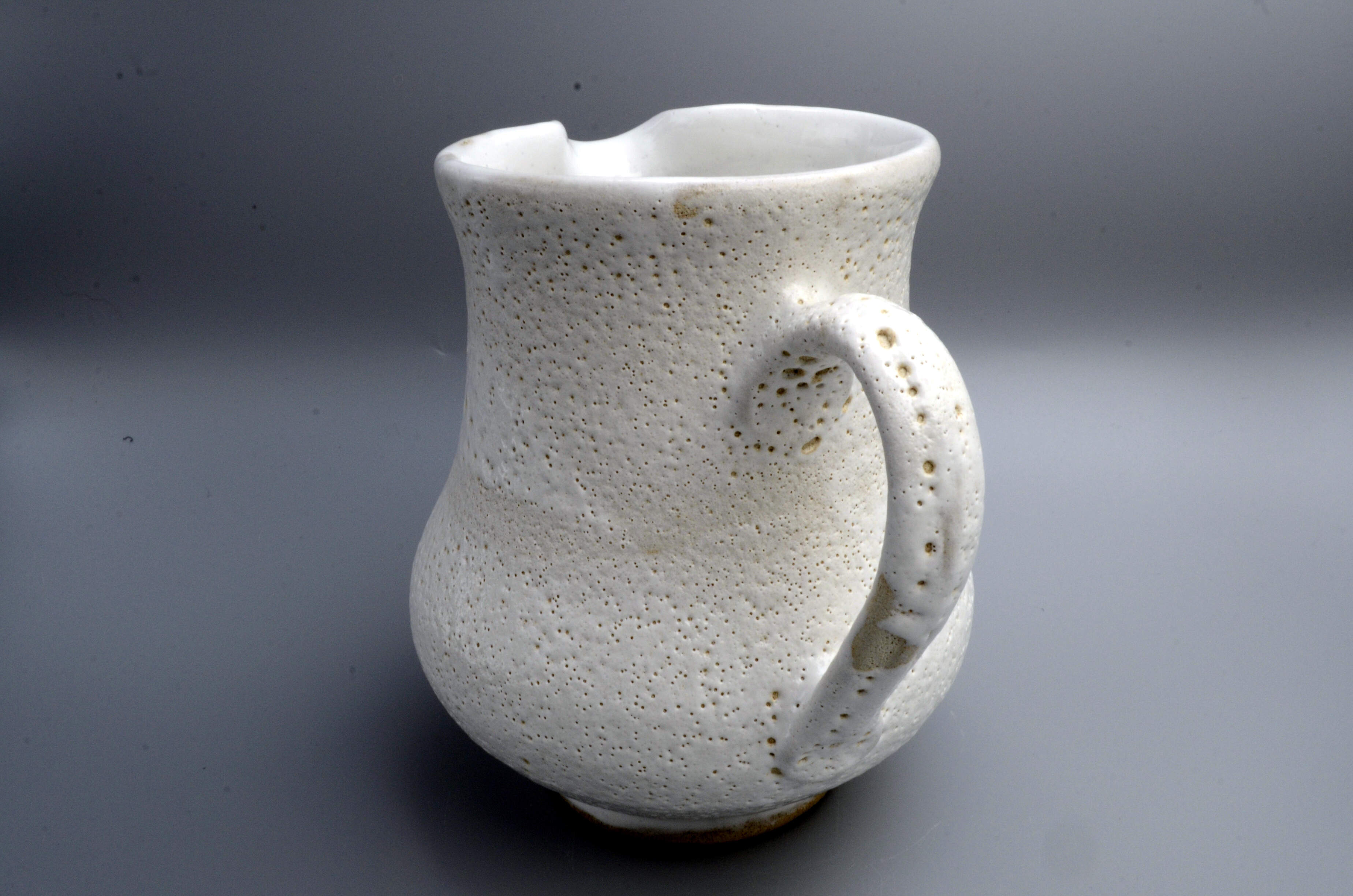 A large one-off volcanic glazed jug to show off at any occasion