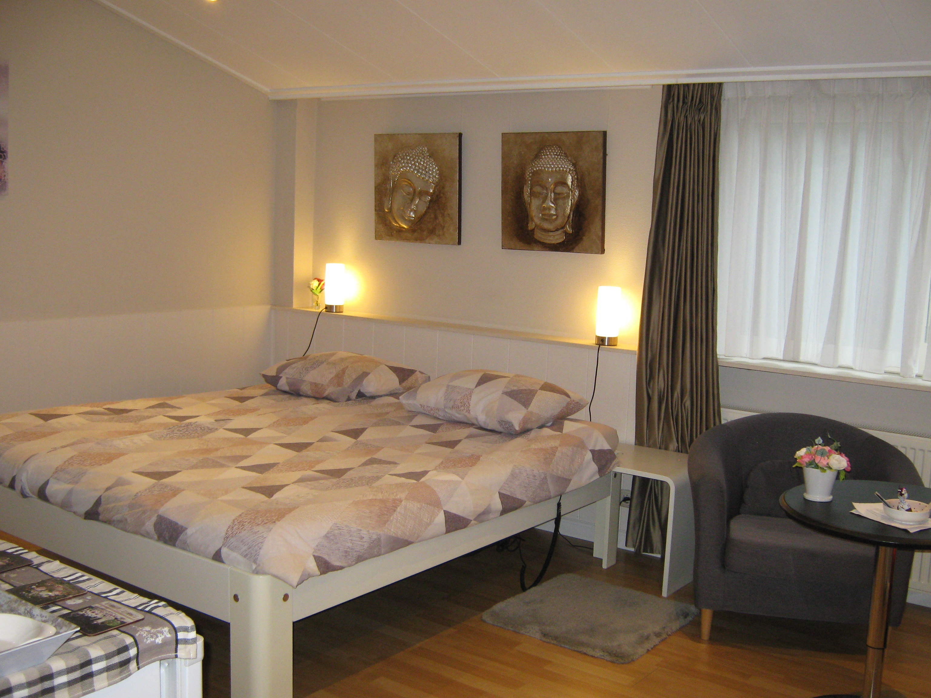 Lits-Jumeaux bed met 2 apart elektrisch verstelbare bedbodems.