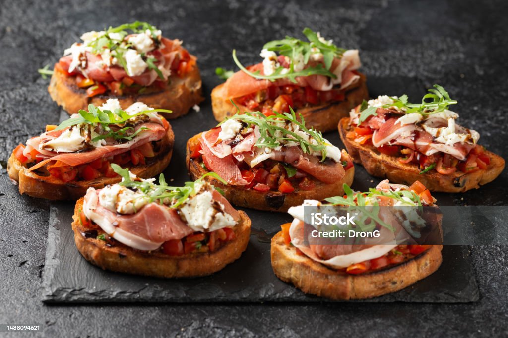 Steak Crostini with Maitake Mushroom Duxelles and Herbed Cheese and Microgreens