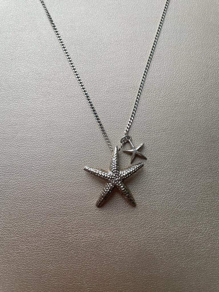 Double starfish pendant