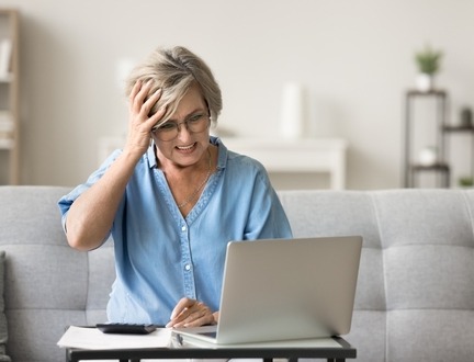 <img src="your_image_source.jpg" alt="Stressed woman facing divorce, overwhelmed by life changes. Expert financial planners offer guidance and empower informed decisions for restructuring financial life during divorce. Where to live and sustaining lifestyle concerns addressed.">