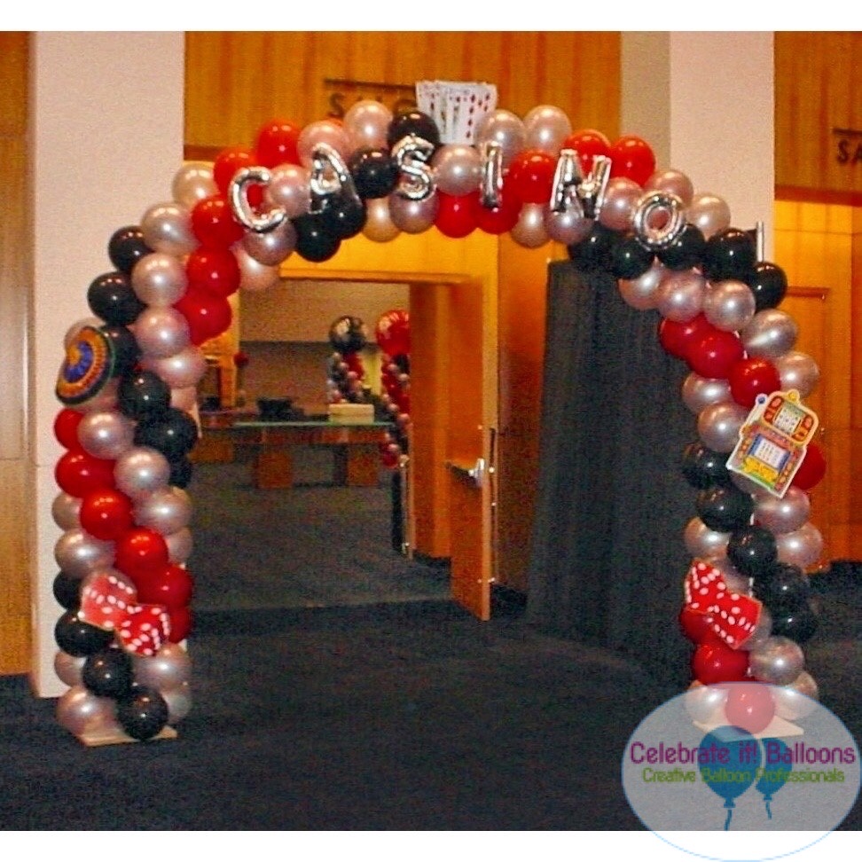 Casino themed balloon arch with balloon letters