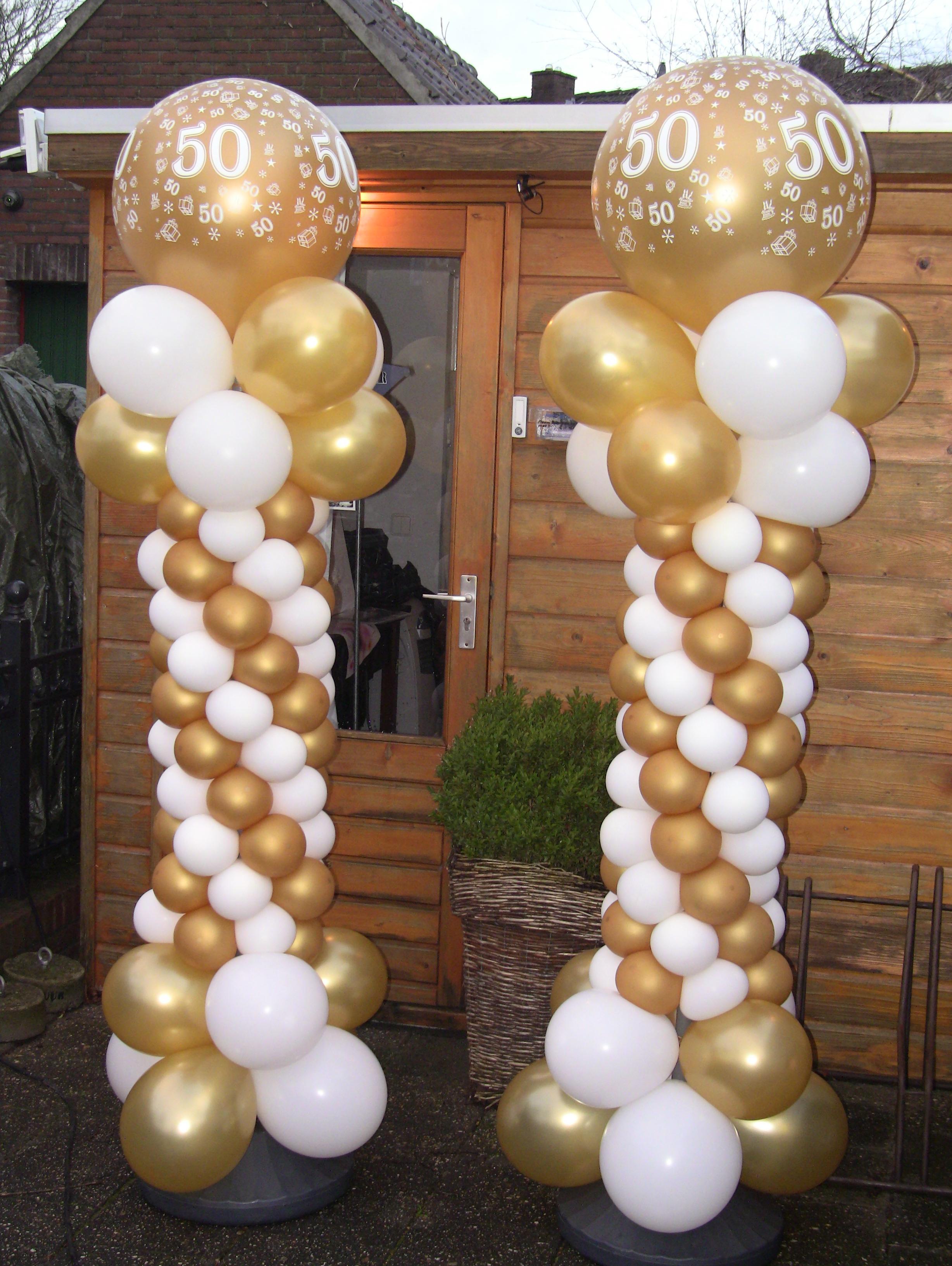 Ballonnen pilaren goud wit