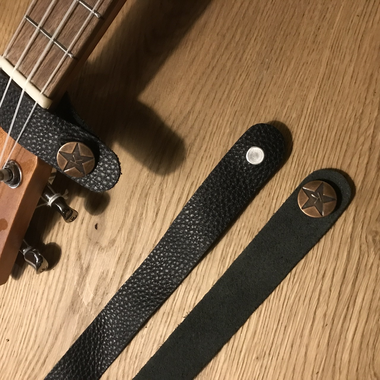 Riempje ukulelestrap bevestiging