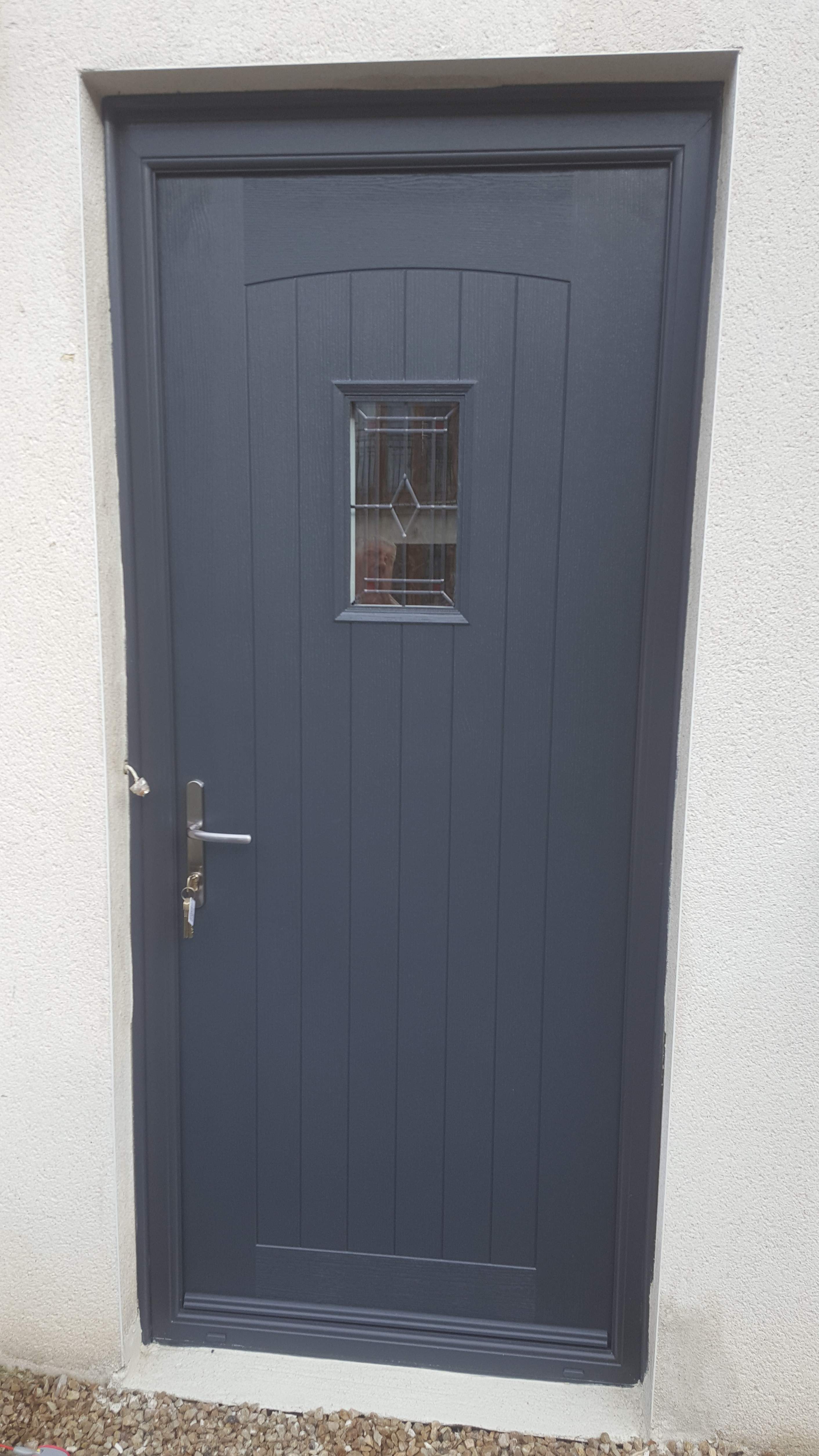 ANTHRACITE GREY APEER APY2 COMPOSITE FRONT DOOR FITTED BY ASGARD WINDOWS IN DUBLIN.