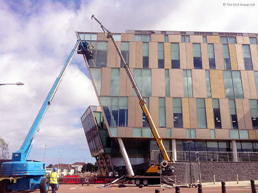 Glass replacement with crane and MEWP