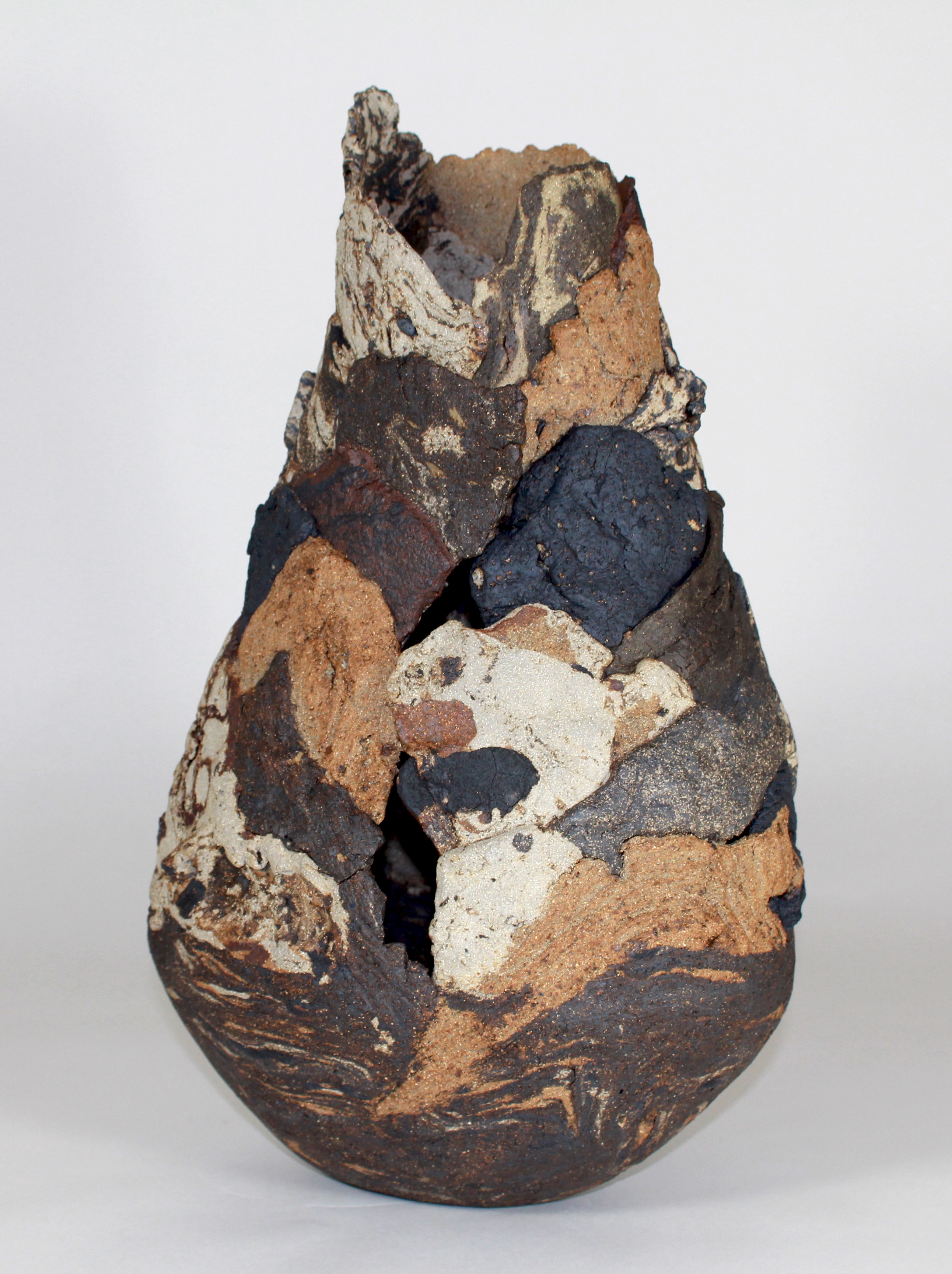 Artist own mixed and marbled stoneware. Reduction fired to 1280oC. 38cm tall x 28 wide