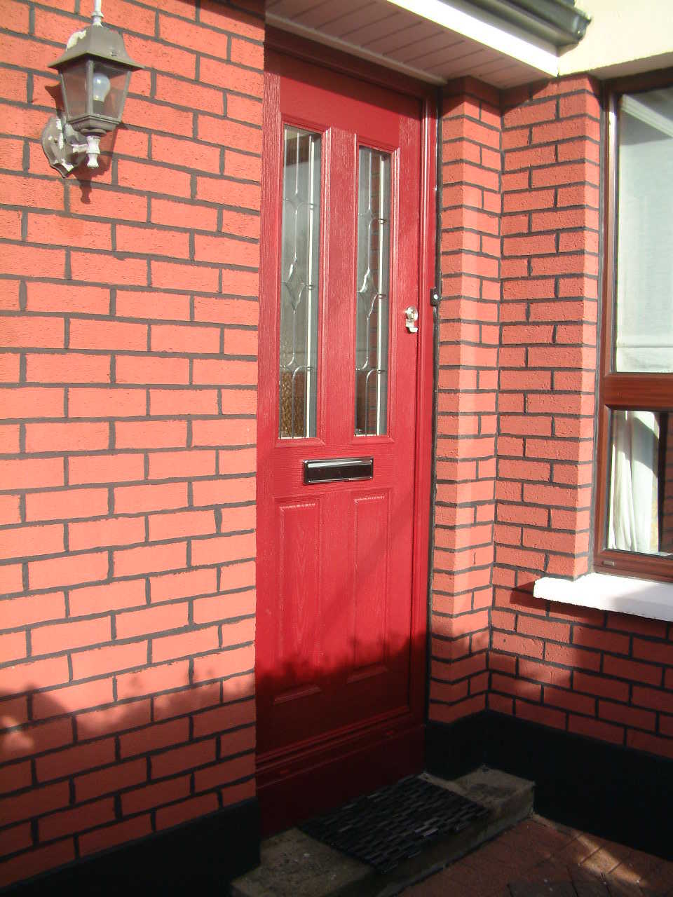 RED APEER APM2 COMPOSITE FRONT DOOR FITTED BY ASGARD WINDOWS IN DUBLIN