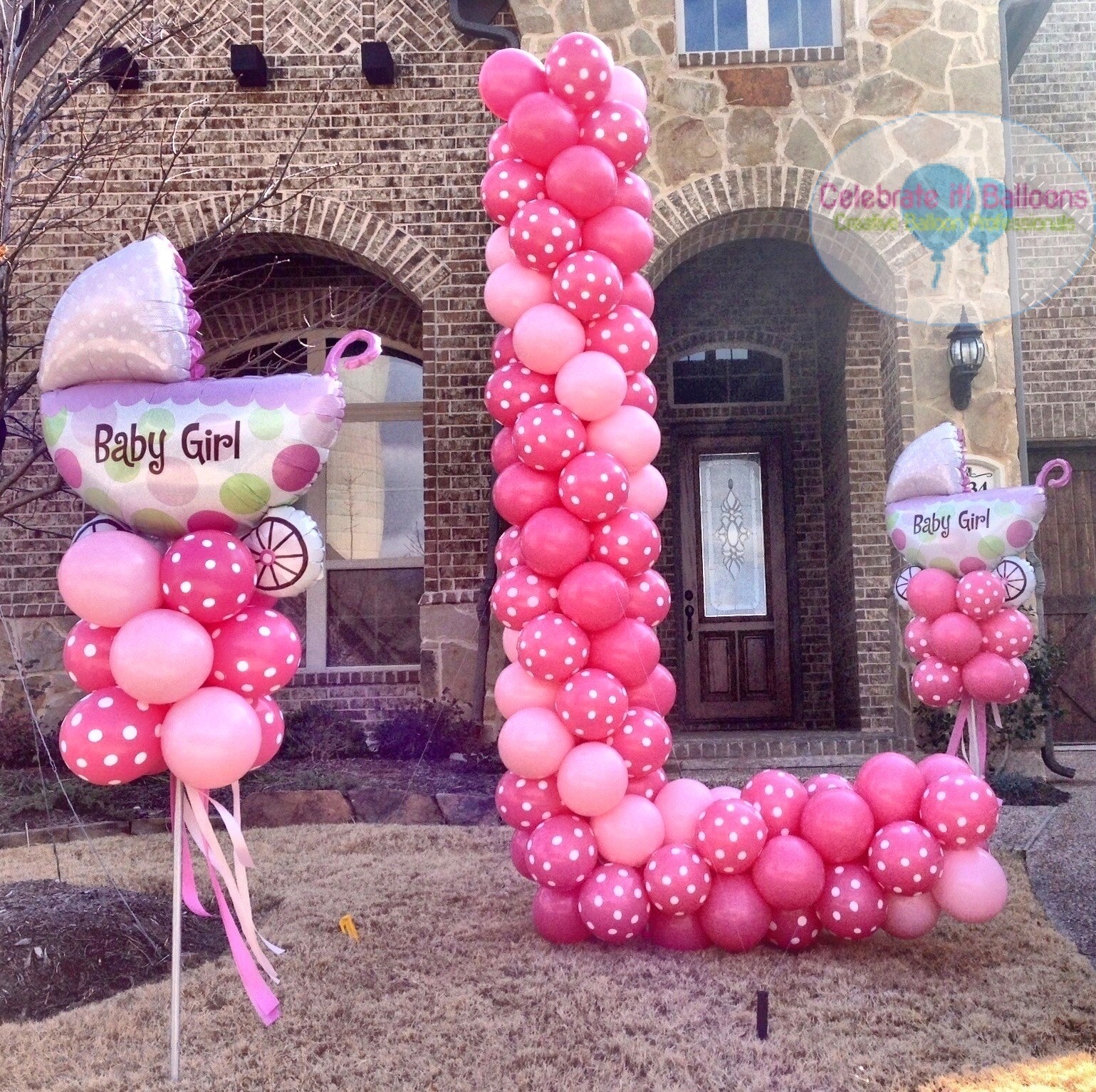 Welcome home baby yard balloons birth announcement balloon delivery in pink and pink polka dots.
